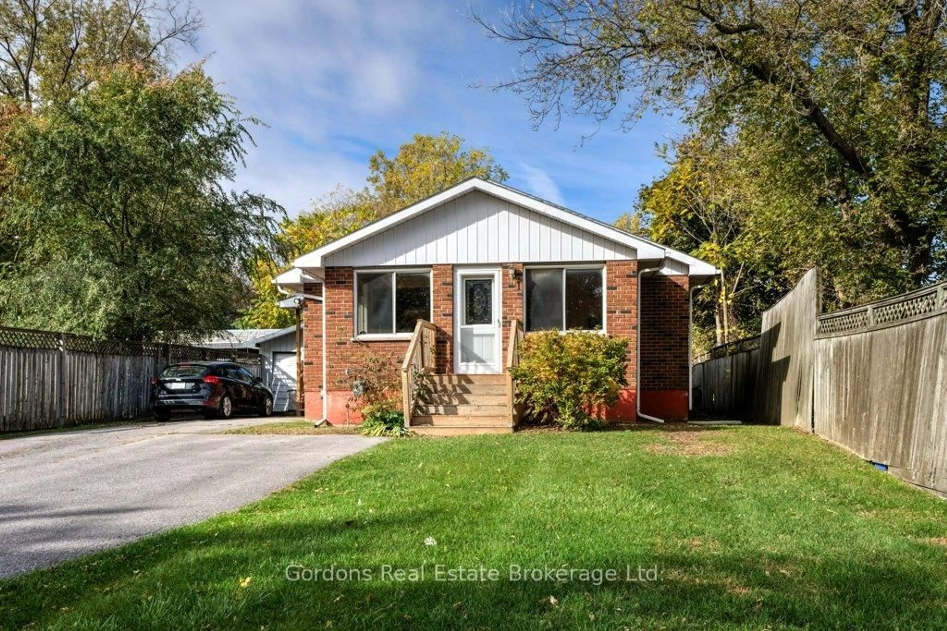 Home with brick exterior material, street for 126 County Rd 10, Prince Edward County Ontario K0K 2T0