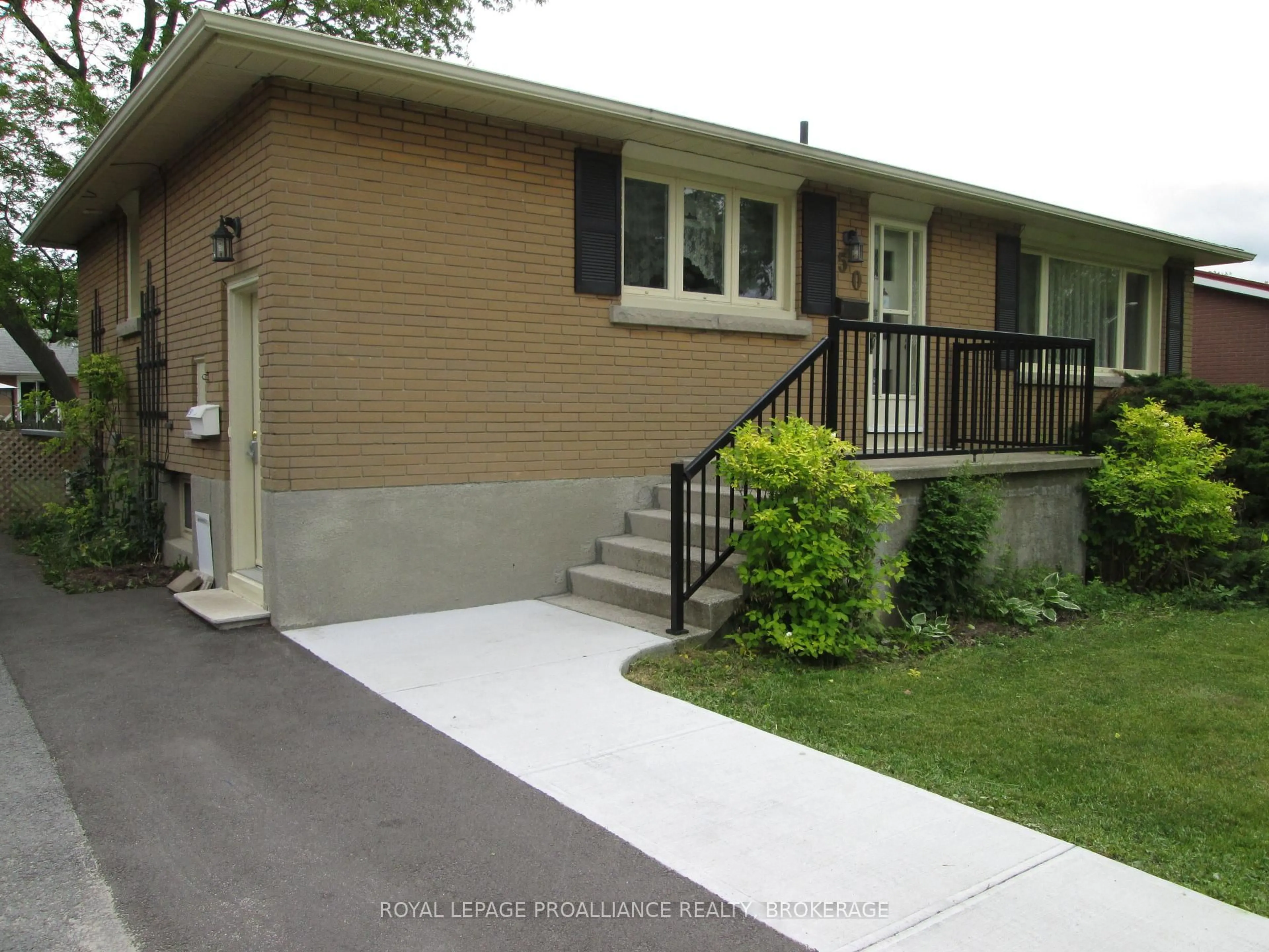 Home with vinyl exterior material, street for 50 Campbell Cres, Kingston Ontario K7M 1Z5
