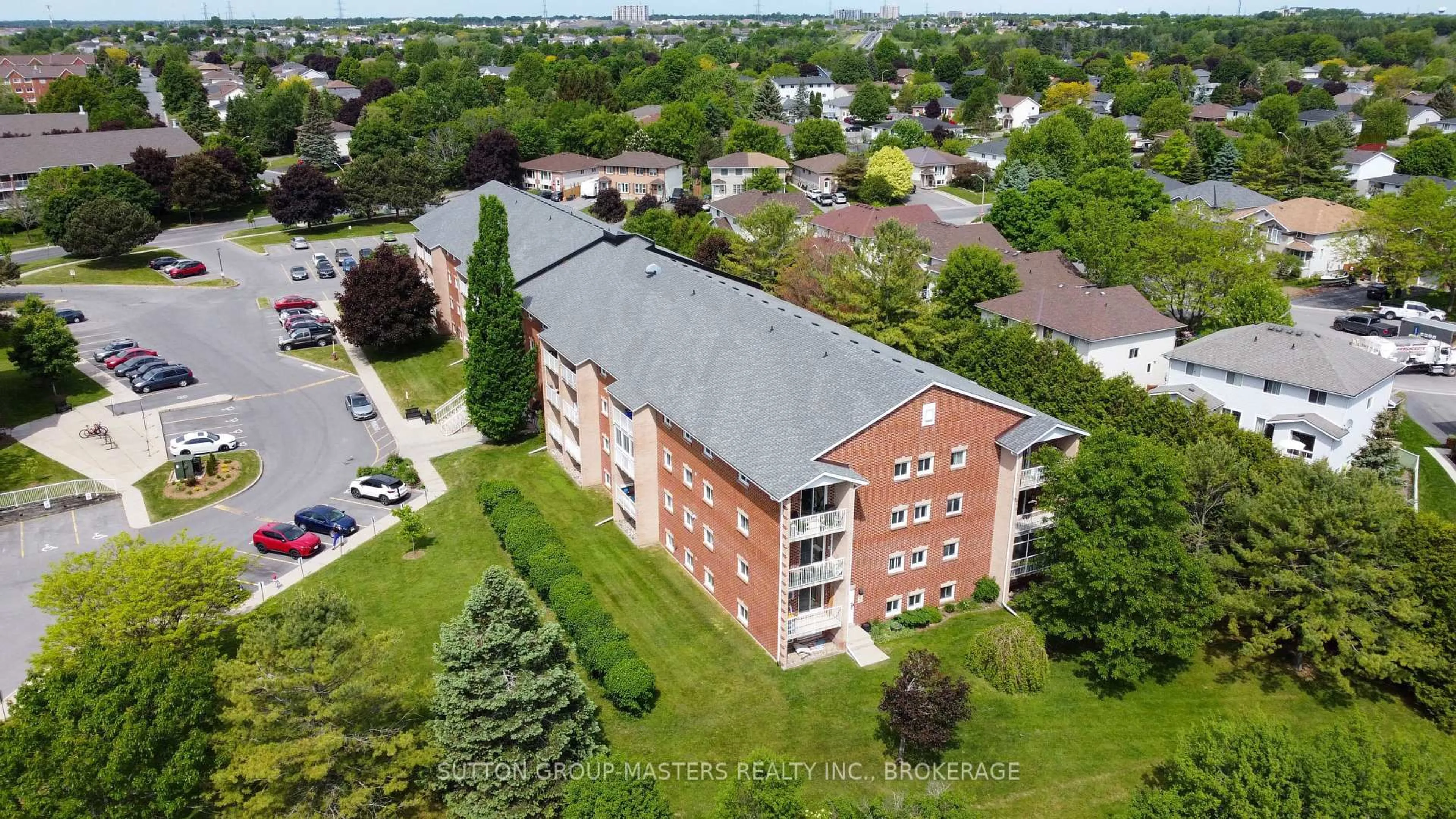 A pic from outside/outdoor area/front of a property/back of a property/a pic from drone, building for 580 Armstrong Rd #114, Kingston Ontario K7M 8M3