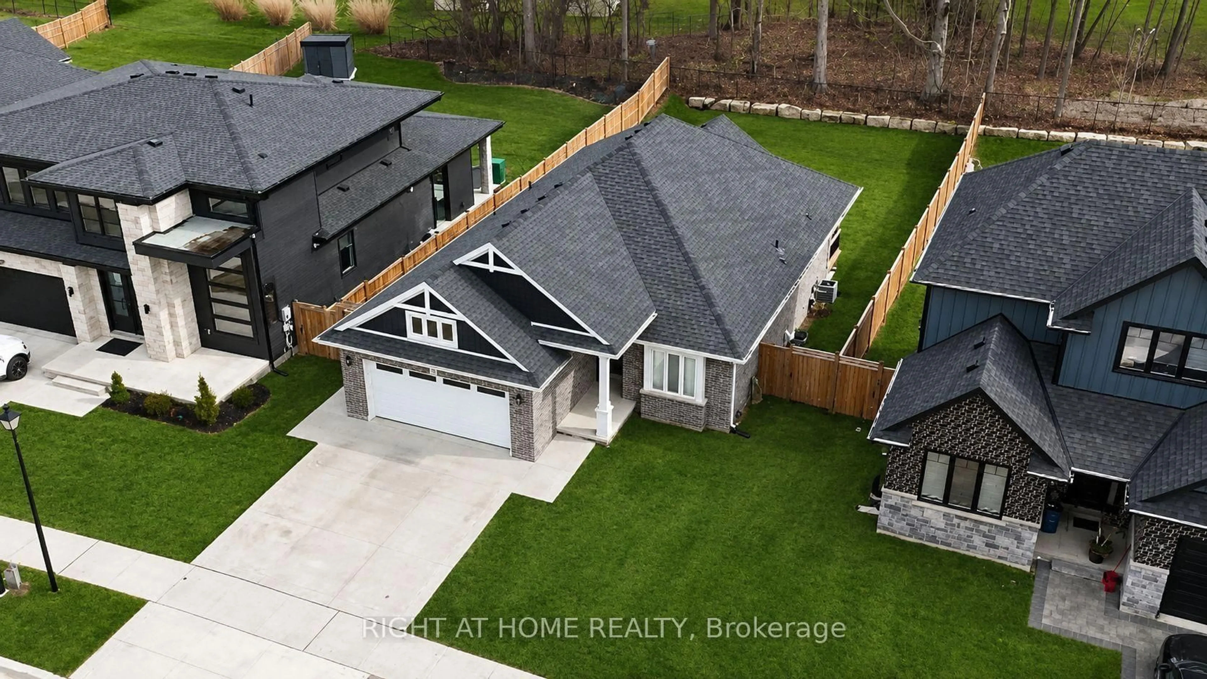 A pic from outside/outdoor area/front of a property/back of a property/a pic from drone, street for 95 Optimist Dr, Southwold Ontario N5P 3T2