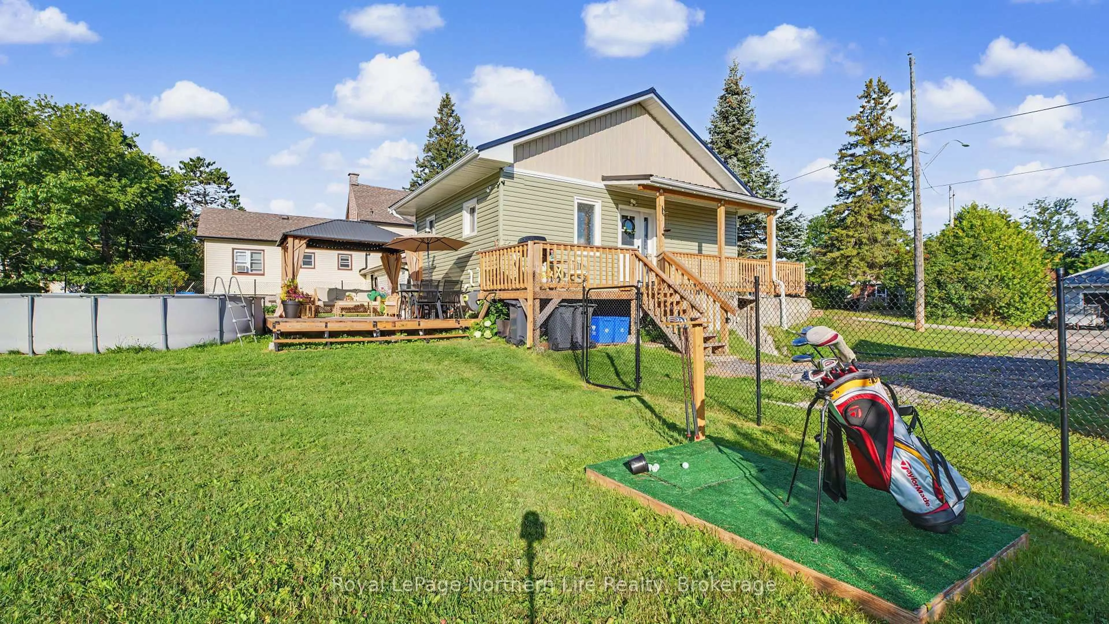 A pic from outside/outdoor area/front of a property/back of a property/a pic from drone, water/lake/river/ocean view for 189 Bay St, Callander Ontario P0H 1H0