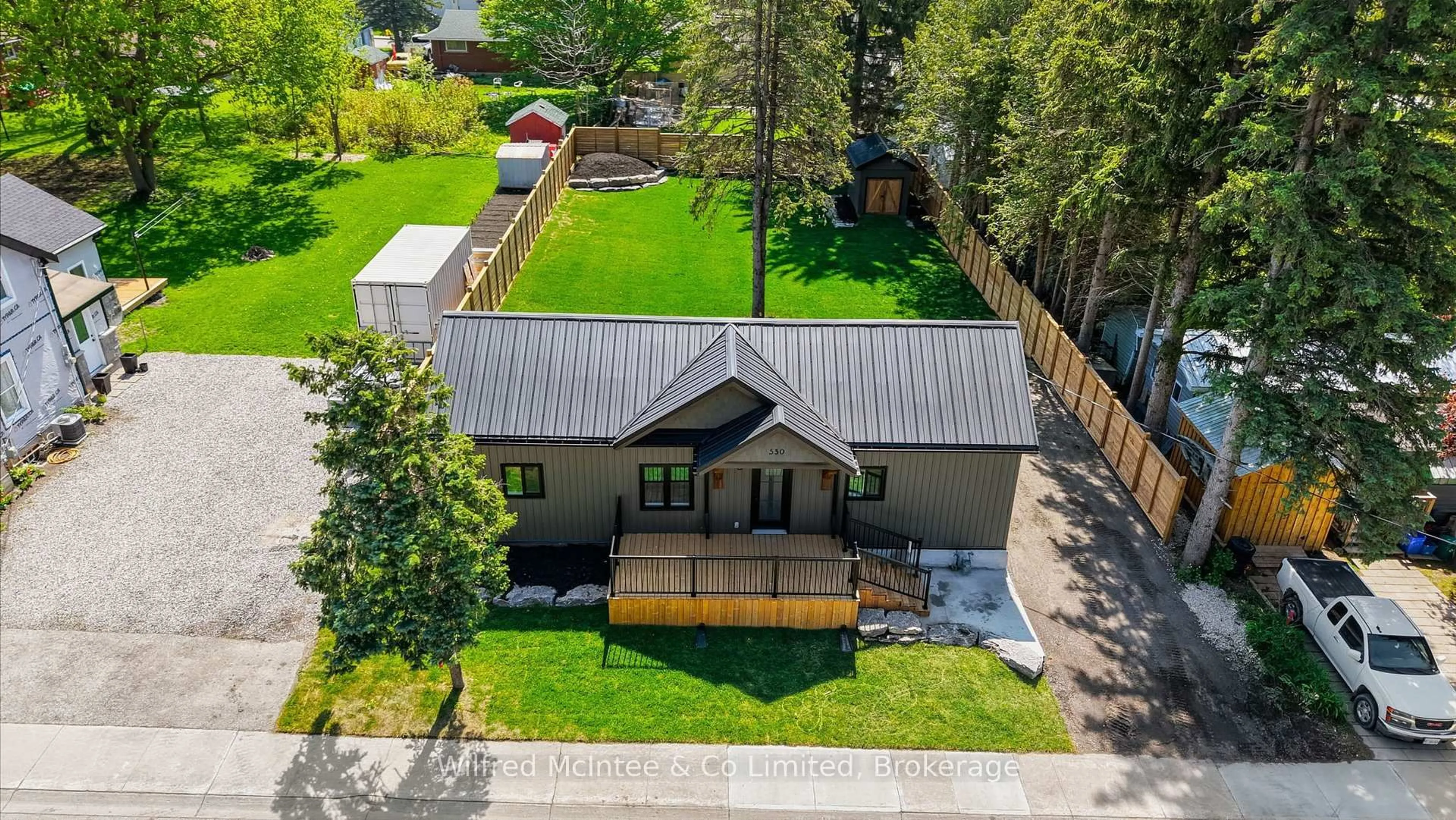 A pic from outside/outdoor area/front of a property/back of a property/a pic from drone, street for 550 Wellington St, Minto Ontario N4W 3G9