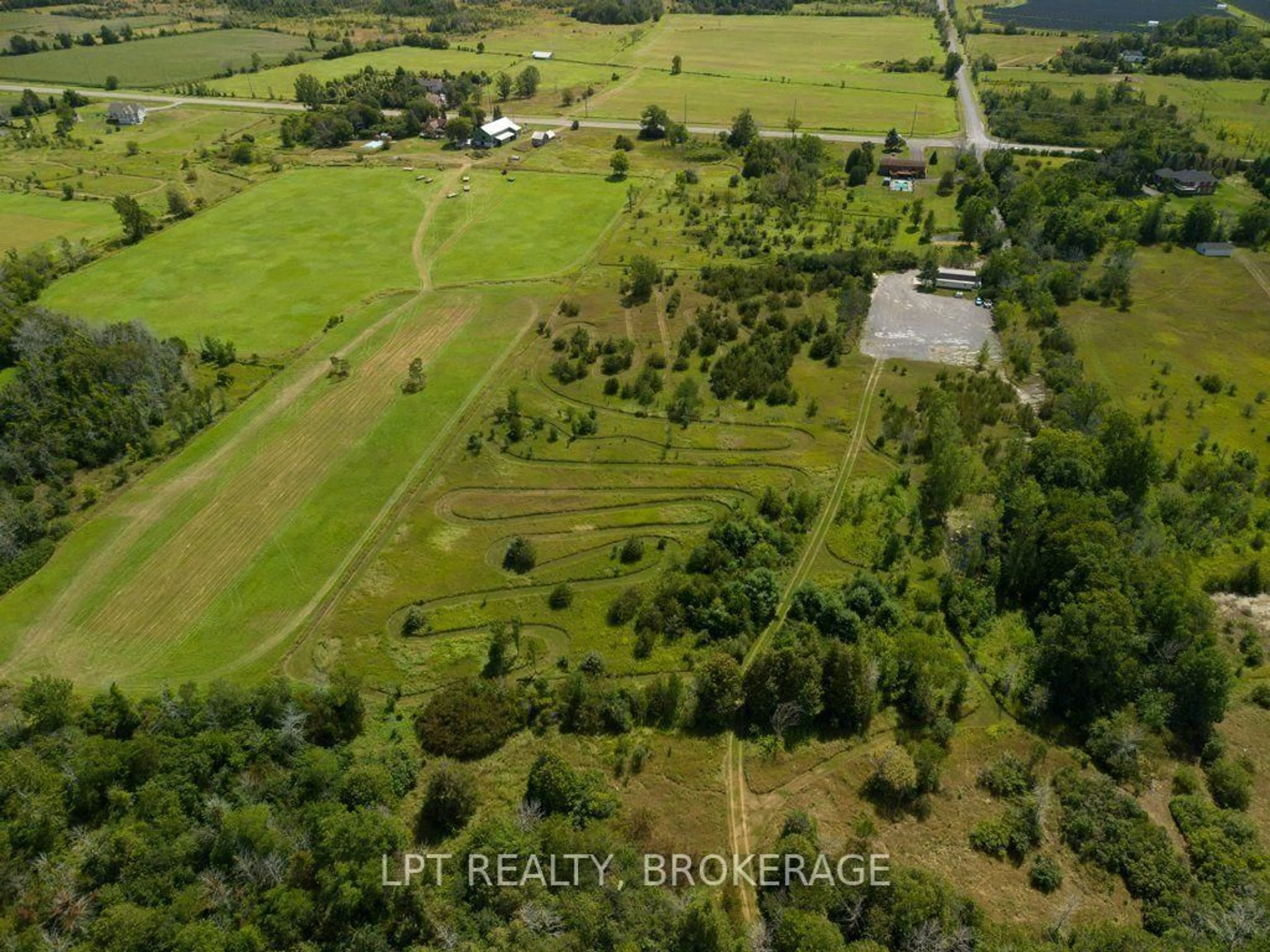 A pic from outside/outdoor area/front of a property/back of a property/a pic from drone, forest/trees view for 4404 Unity Rd, Bissett Creek Ontario K0H 2H0