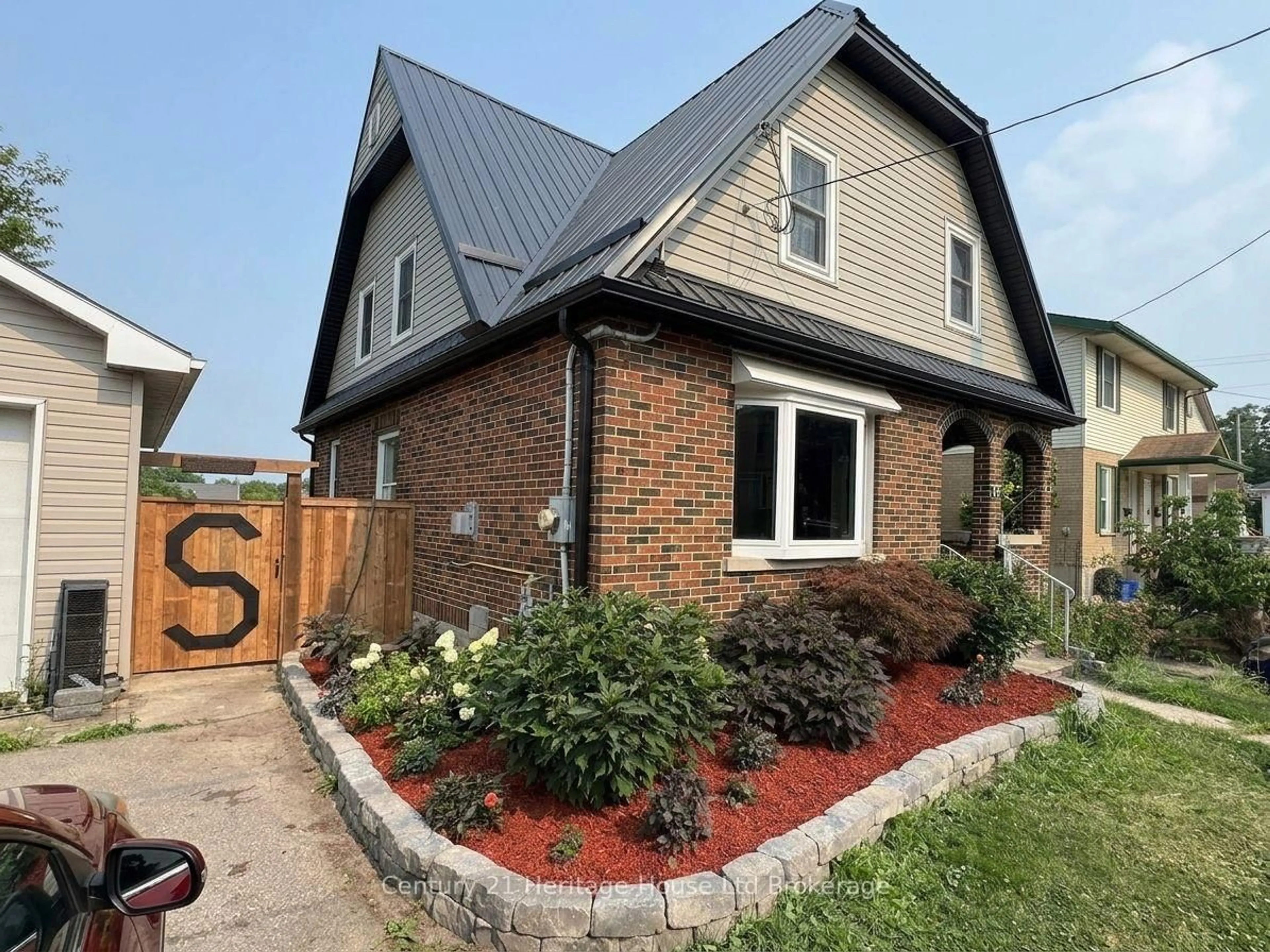 Home with brick exterior material, street for 87 Bay St, Woodstock Ontario N4S 3K7
