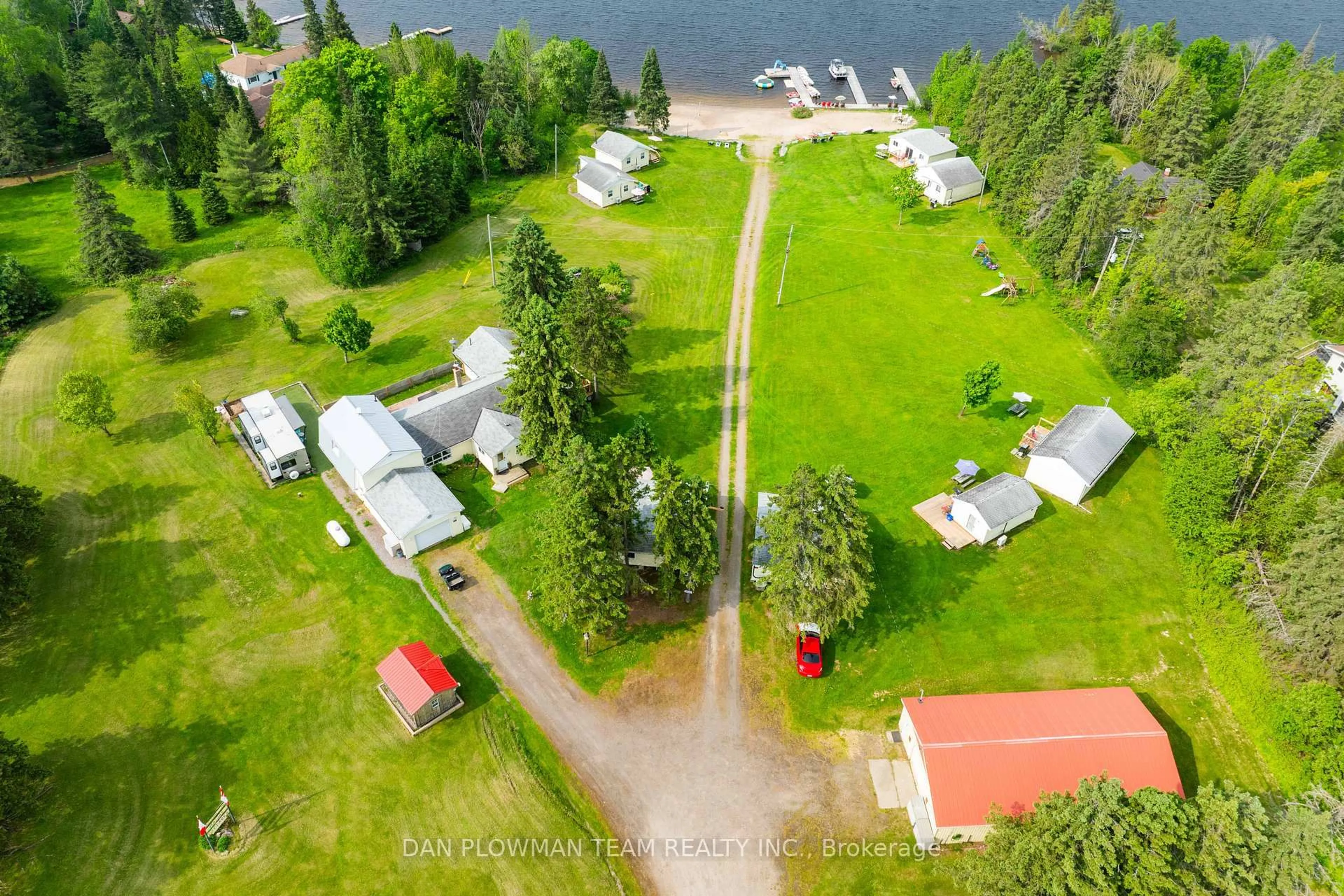 A pic from outside/outdoor area/front of a property/back of a property/a pic from drone, water/lake/river/ocean view for 184 Chapman Dr, Magnetawan Ontario P0A 1C0