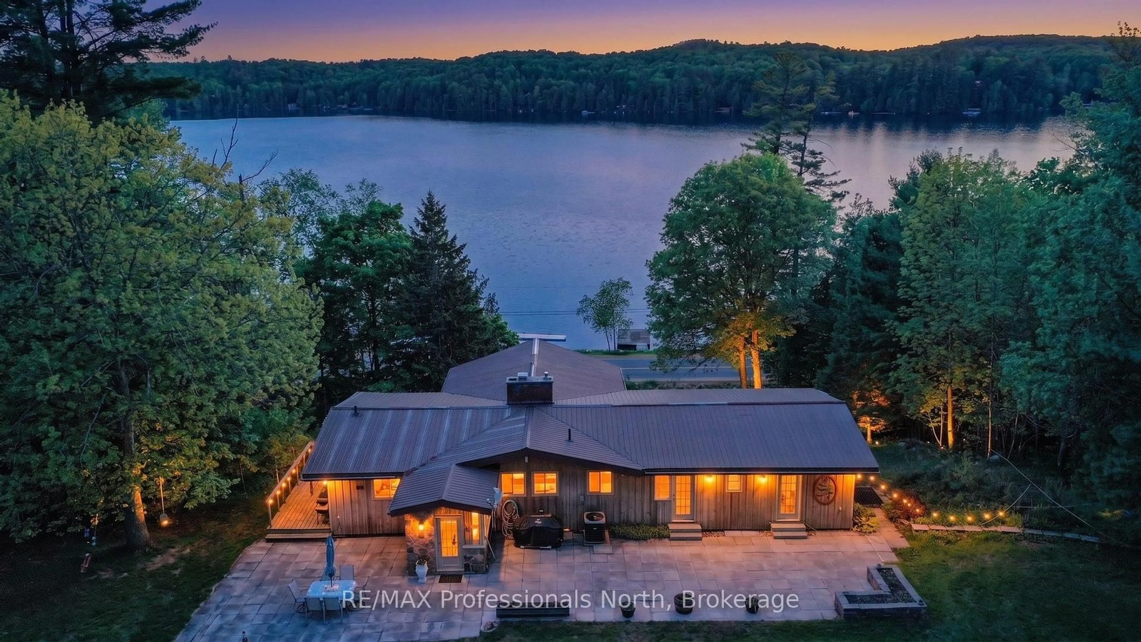 A pic from outside/outdoor area/front of a property/back of a property/a pic from drone, water/lake/river/ocean view for 1015 Kelson Rd, Minden Hills Ontario K0M 2K0