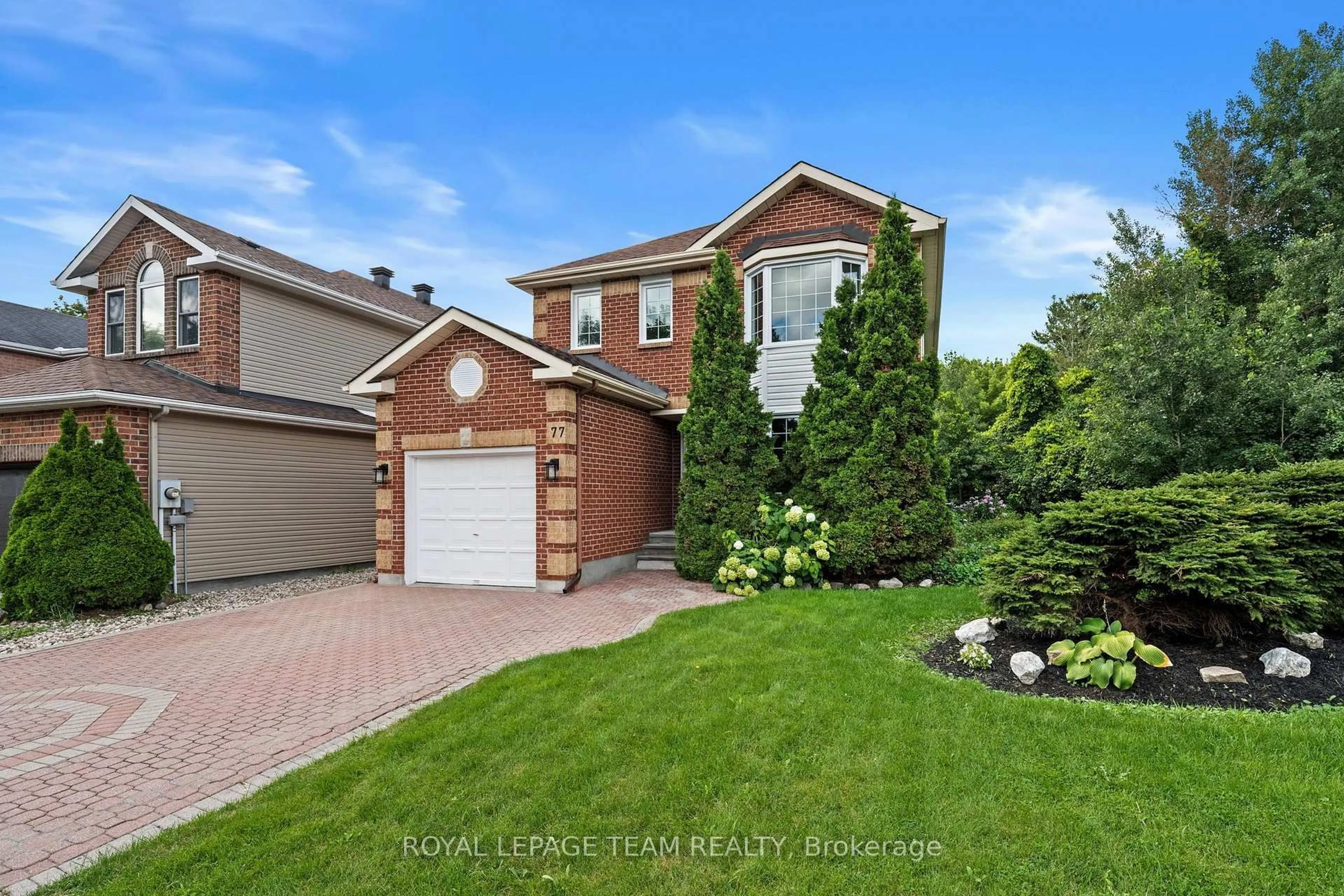 Home with brick exterior material, street for 77 Sherring Crt, Kanata Ontario K2K 2T1