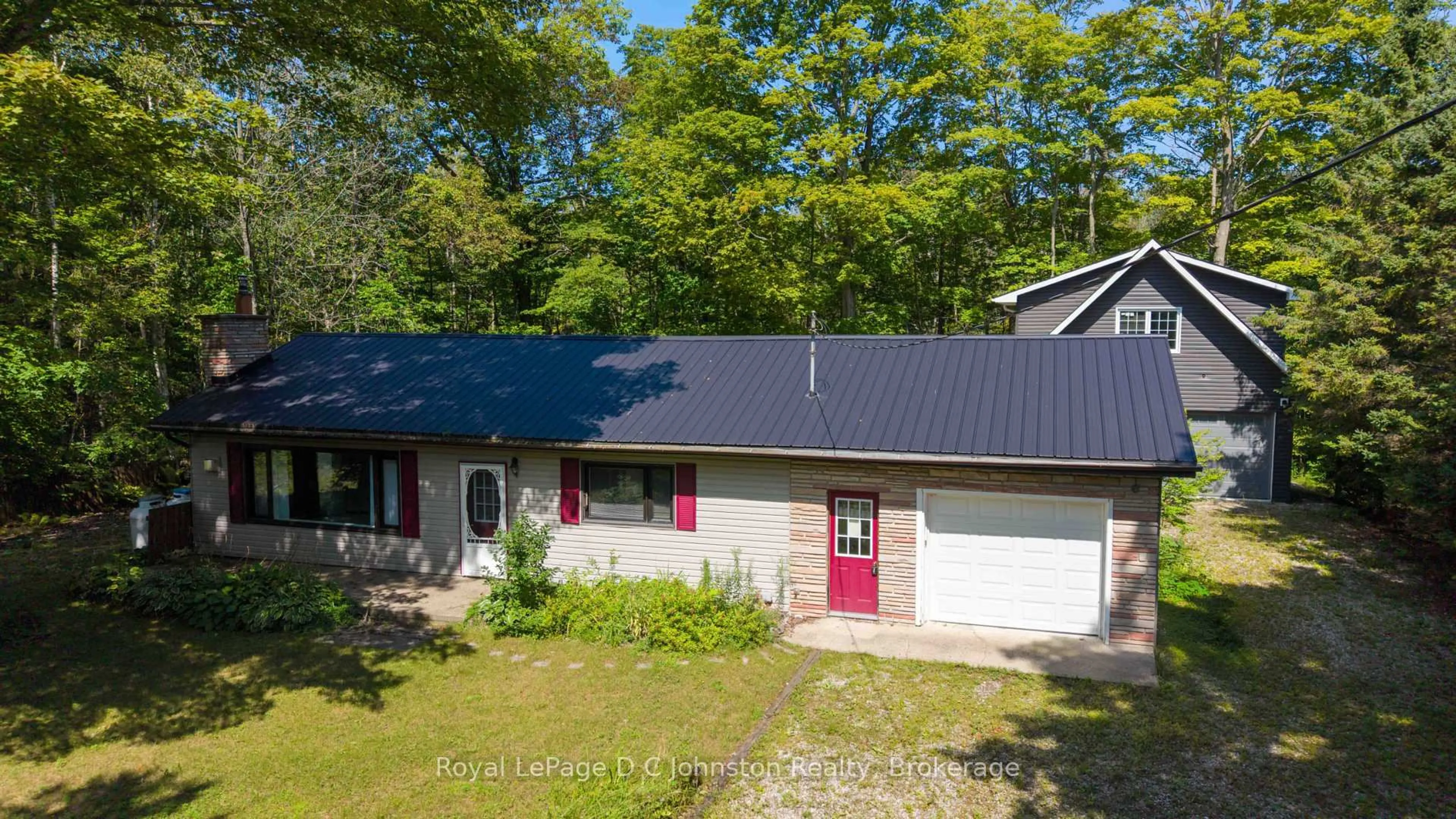 A pic from outside/outdoor area/front of a property/back of a property/a pic from drone, street for 25 Avele Rd, South Bruce Peninsula Ontario N0H 2T0