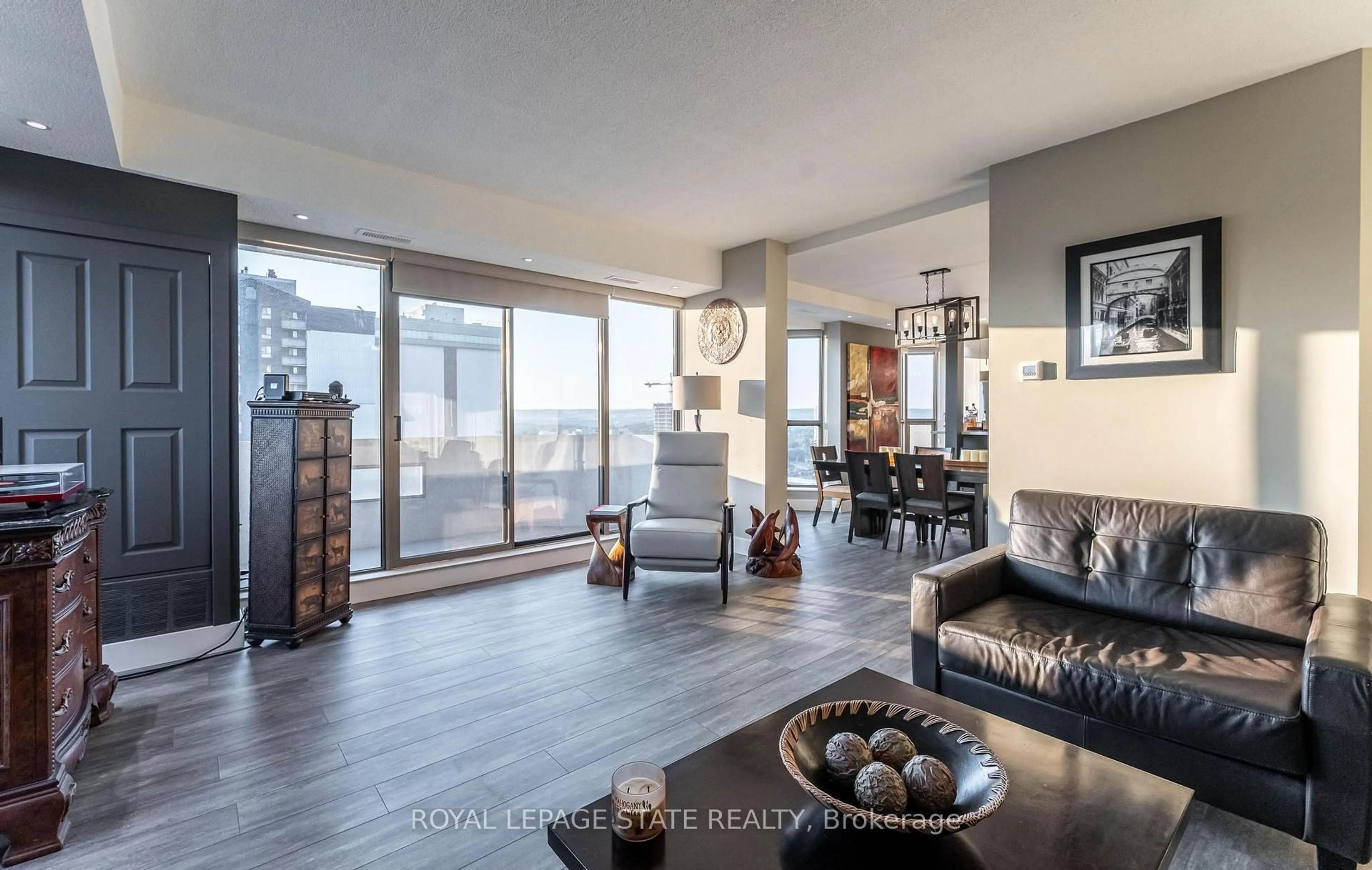 Living room with furniture, unknown for 67 Caroline St #17C, Hamilton Ontario L8P 3K6