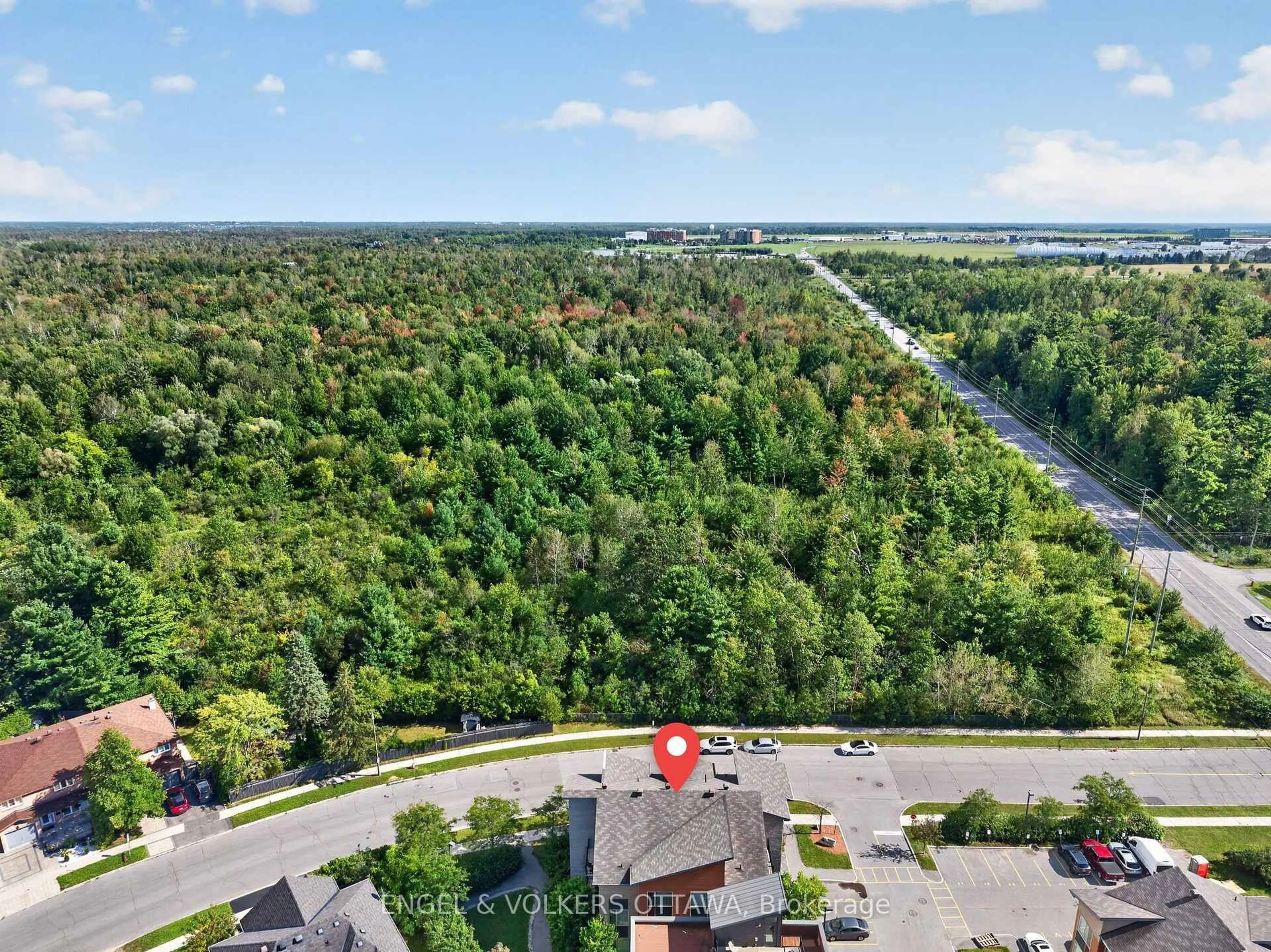 A pic from outside/outdoor area/front of a property/back of a property/a pic from drone, forest/trees view for 3652 Downpatrick Rd, Ottawa Ontario K1V 8Y9