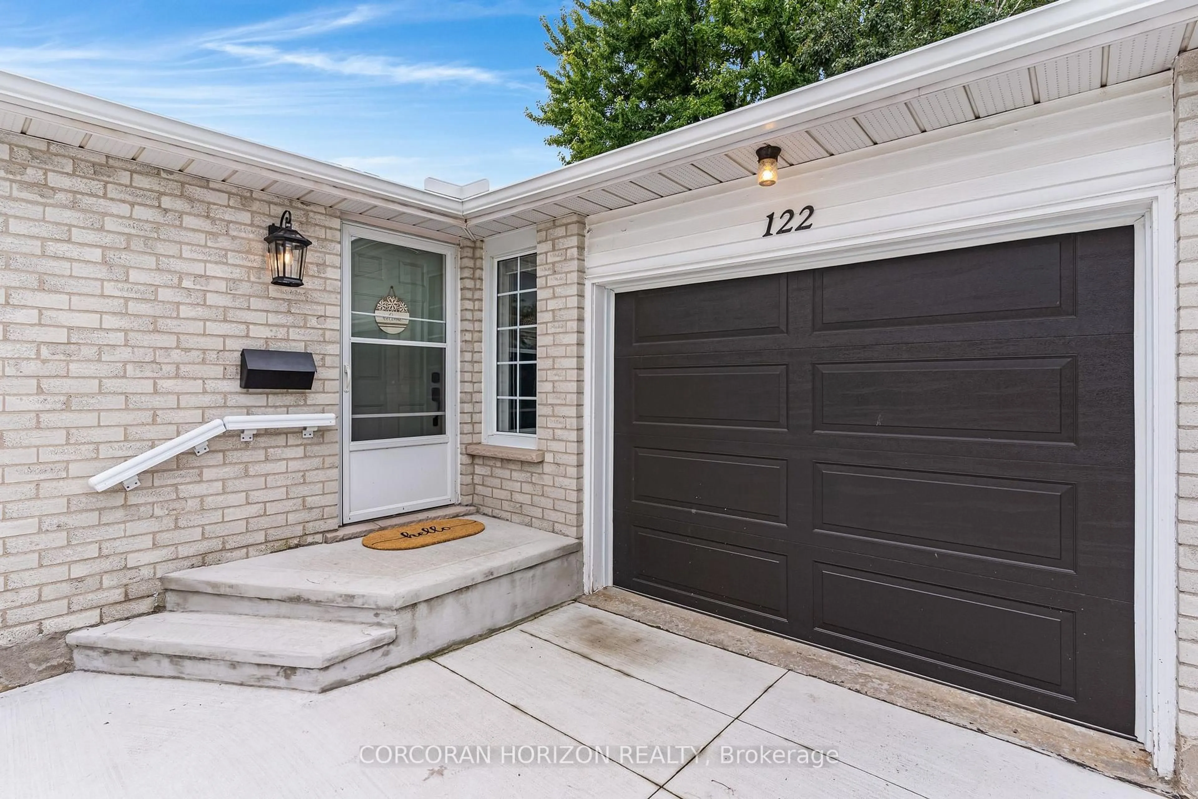 Home with brick exterior material, street for 122 Foxridge Dr, Cambridge Ontario N3C 3M8