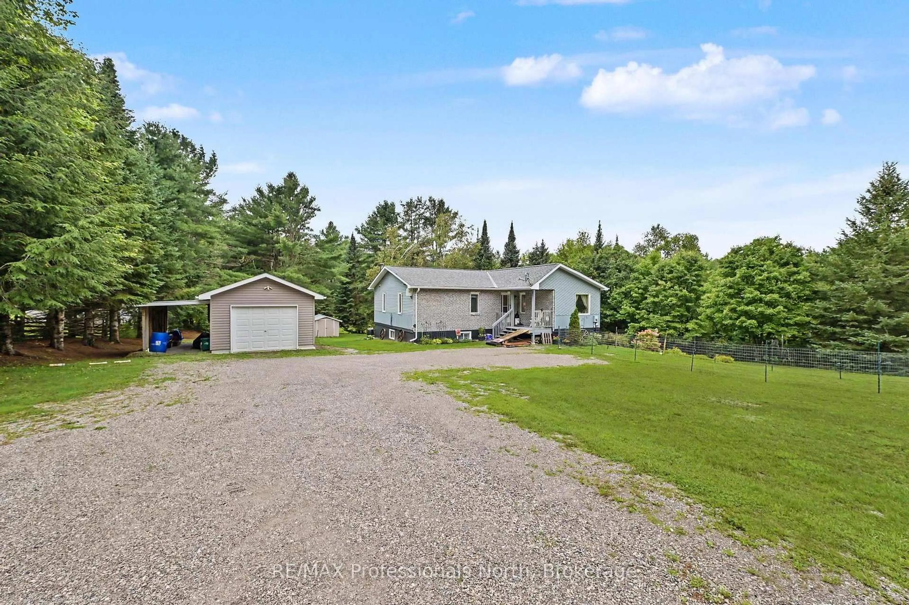 A pic from outside/outdoor area/front of a property/back of a property/a pic from drone, unknown for 1297 Hunter Creek Rd, Minden Hills Ontario K0M 2K0