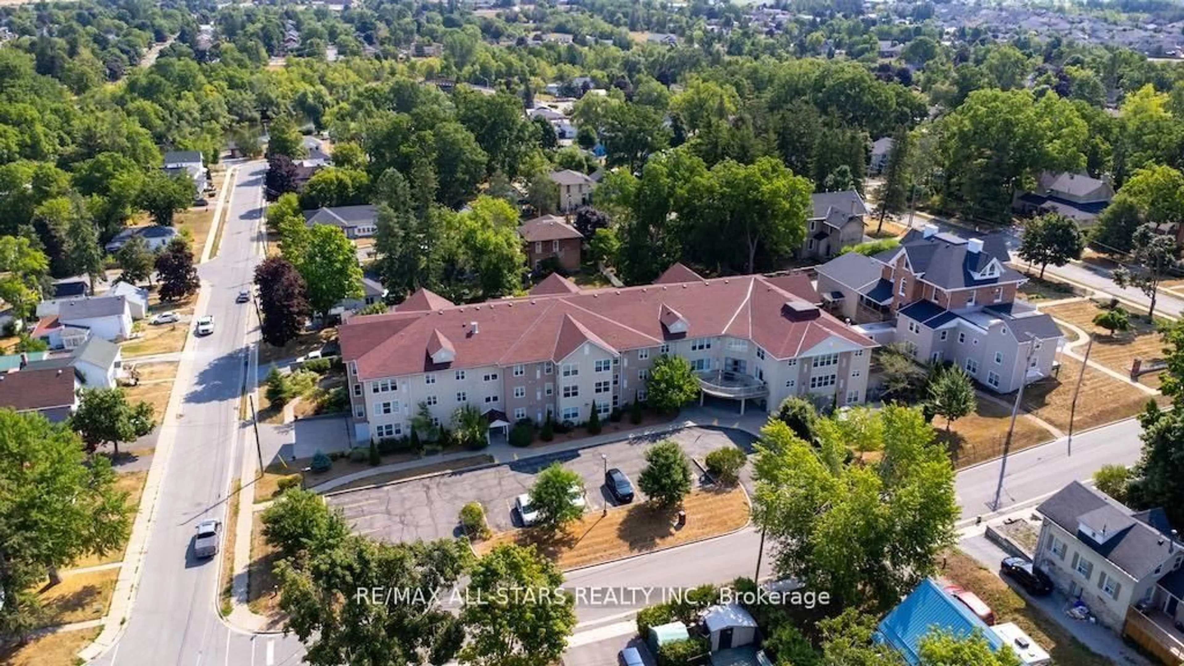A pic from outside/outdoor area/front of a property/back of a property/a pic from drone, unknown for 8 Huron St #106, Kawartha Lakes Ontario K9V 6K3