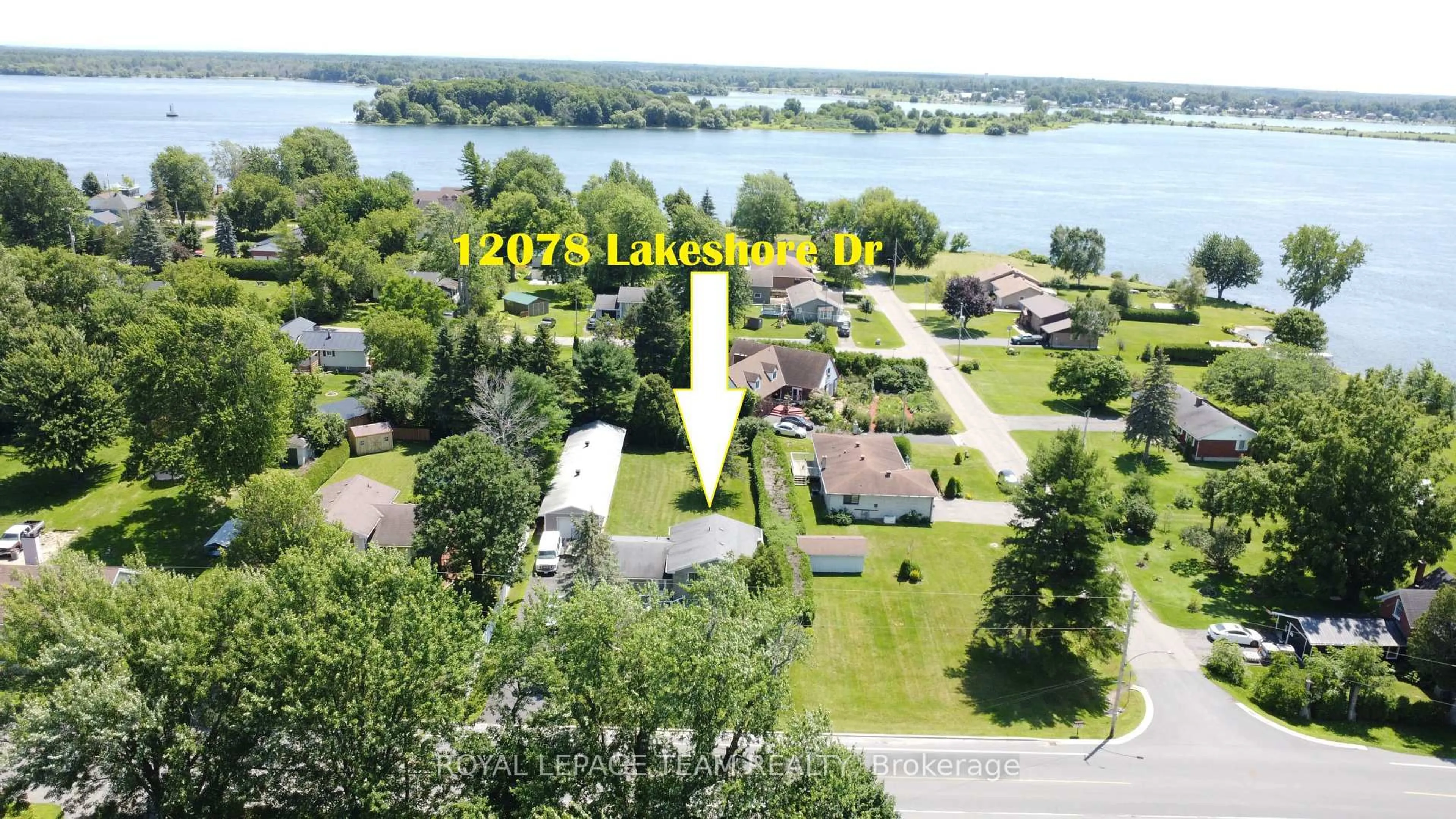 A pic from outside/outdoor area/front of a property/back of a property/a pic from drone, water/lake/river/ocean view for 12078 Lakeshore Dr, South Dundas Ontario K0C 1X0