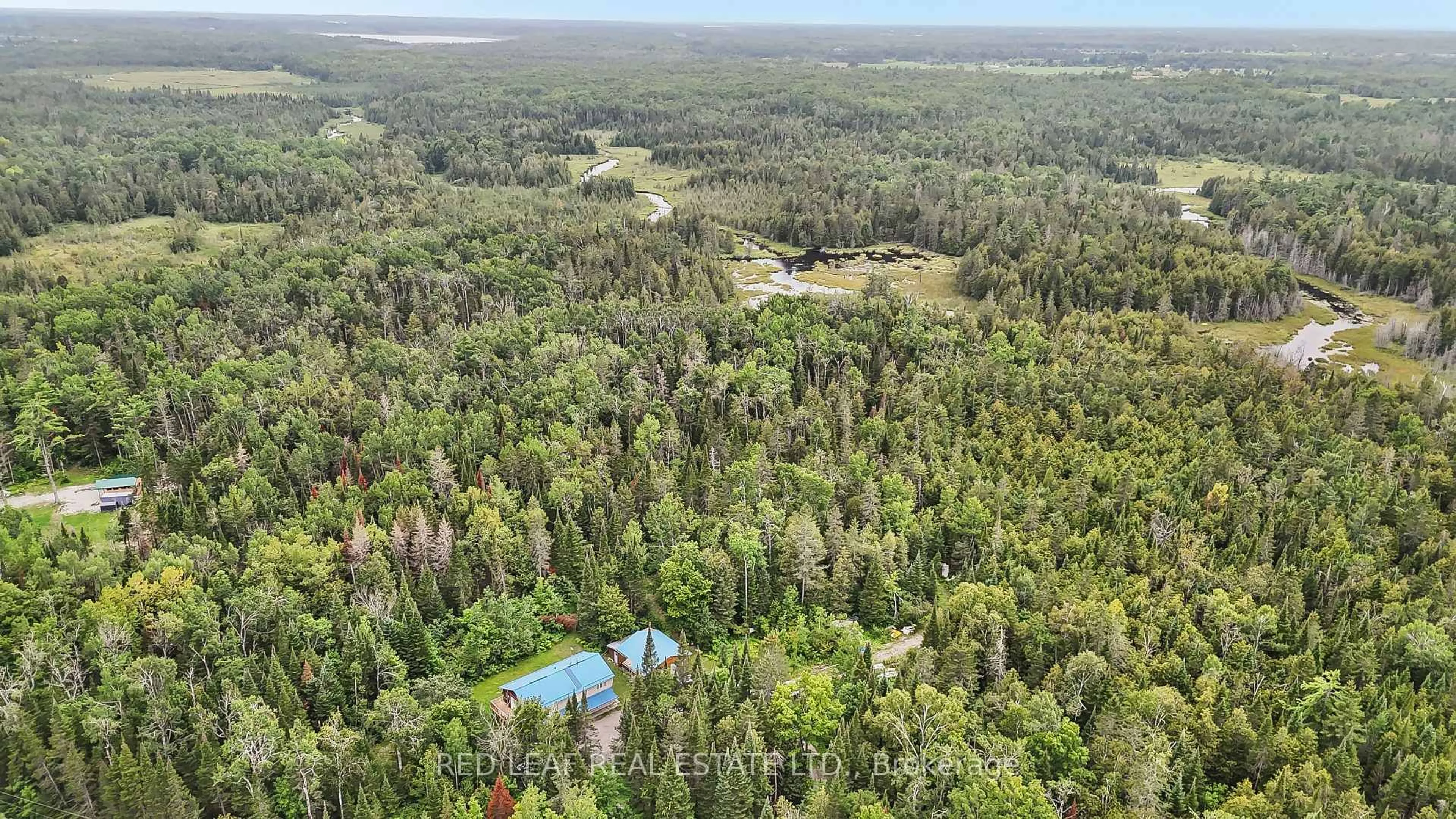 A pic from outside/outdoor area/front of a property/back of a property/a pic from drone, forest/trees view for 175 Maritime Rd, Kawartha Lakes Ontario K0M 2B0