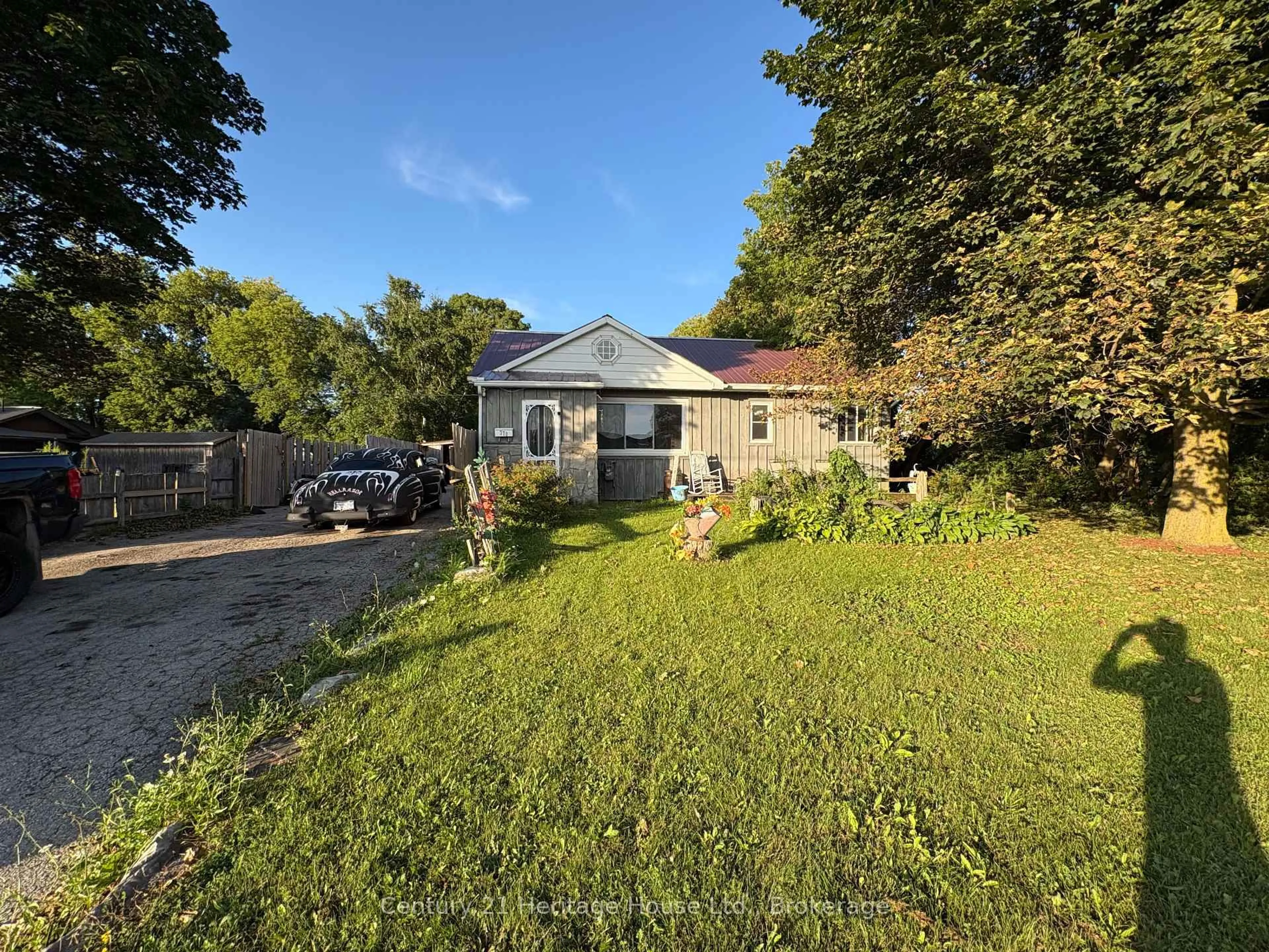 A pic from outside/outdoor area/front of a property/back of a property/a pic from drone, street for 370 Foster St, Wellington North Ontario N0G 2L1