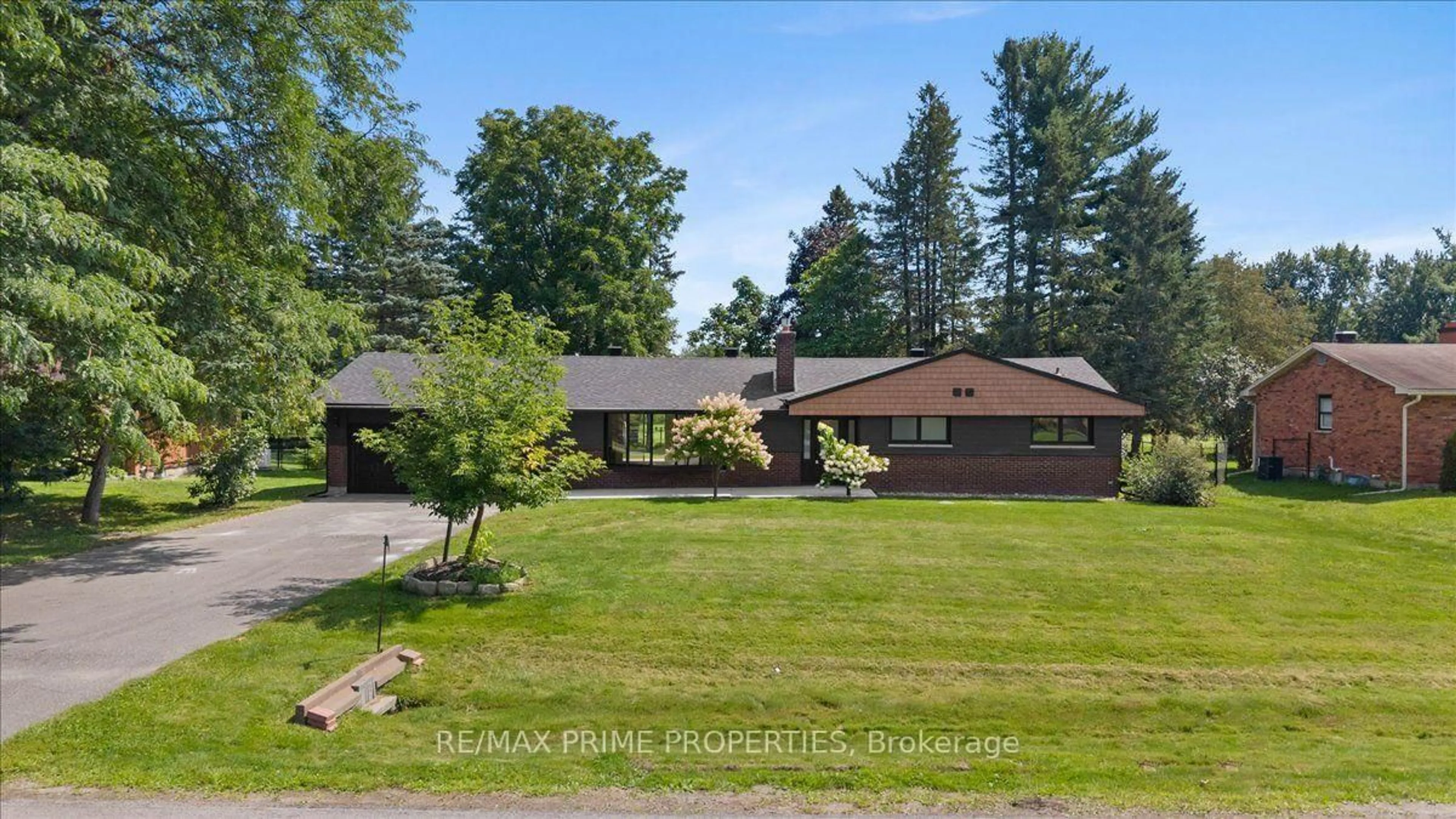A pic from outside/outdoor area/front of a property/back of a property/a pic from drone, street for 6499 Bunker Rd, Manotick Ontario K4M 1B3