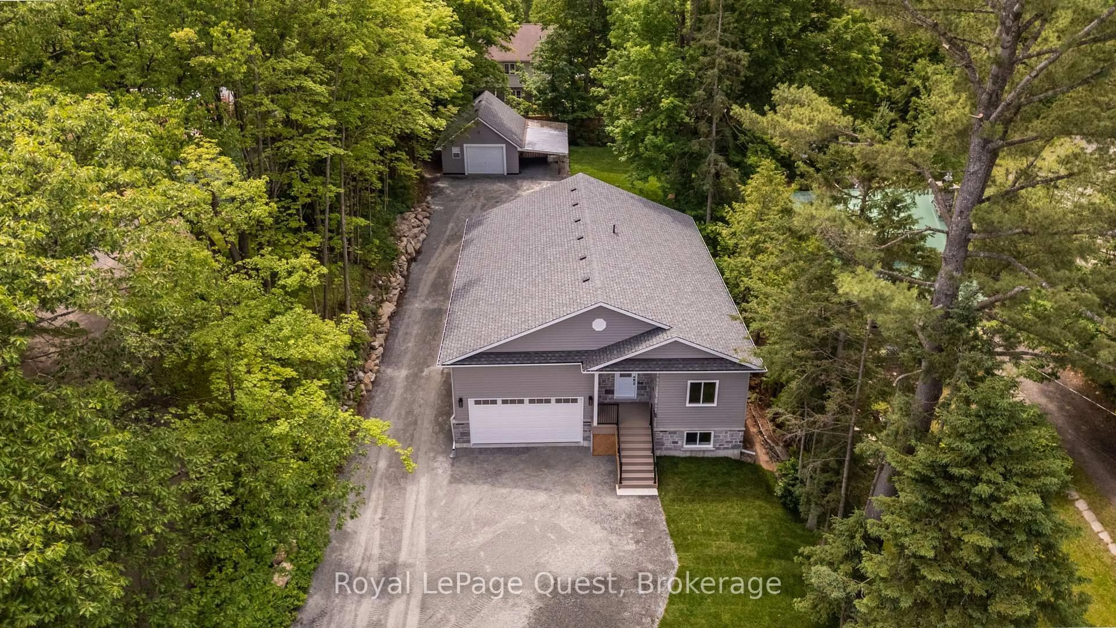A pic from outside/outdoor area/front of a property/back of a property/a pic from drone, street for 57 West Rd, Huntsville Ontario P1H 1L4