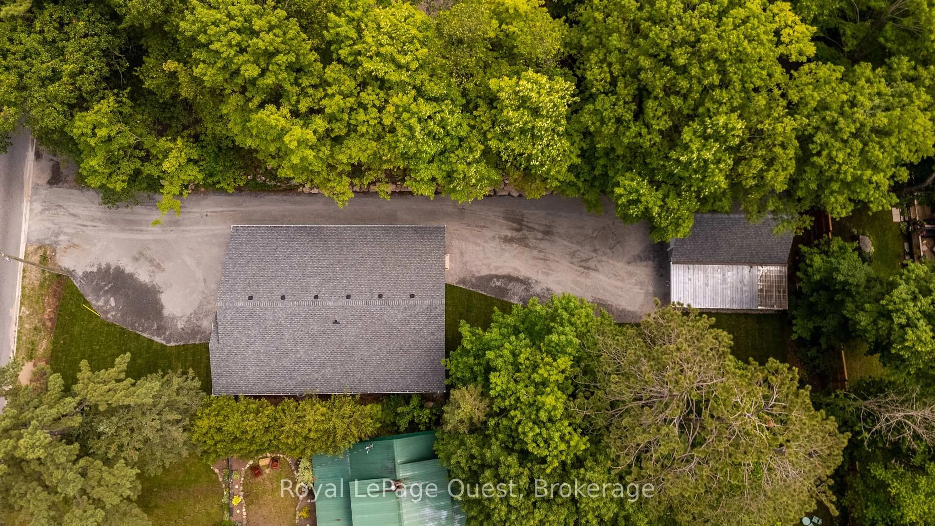 A pic from outside/outdoor area/front of a property/back of a property/a pic from drone, street for 57 West Rd, Huntsville Ontario P1H 1L4