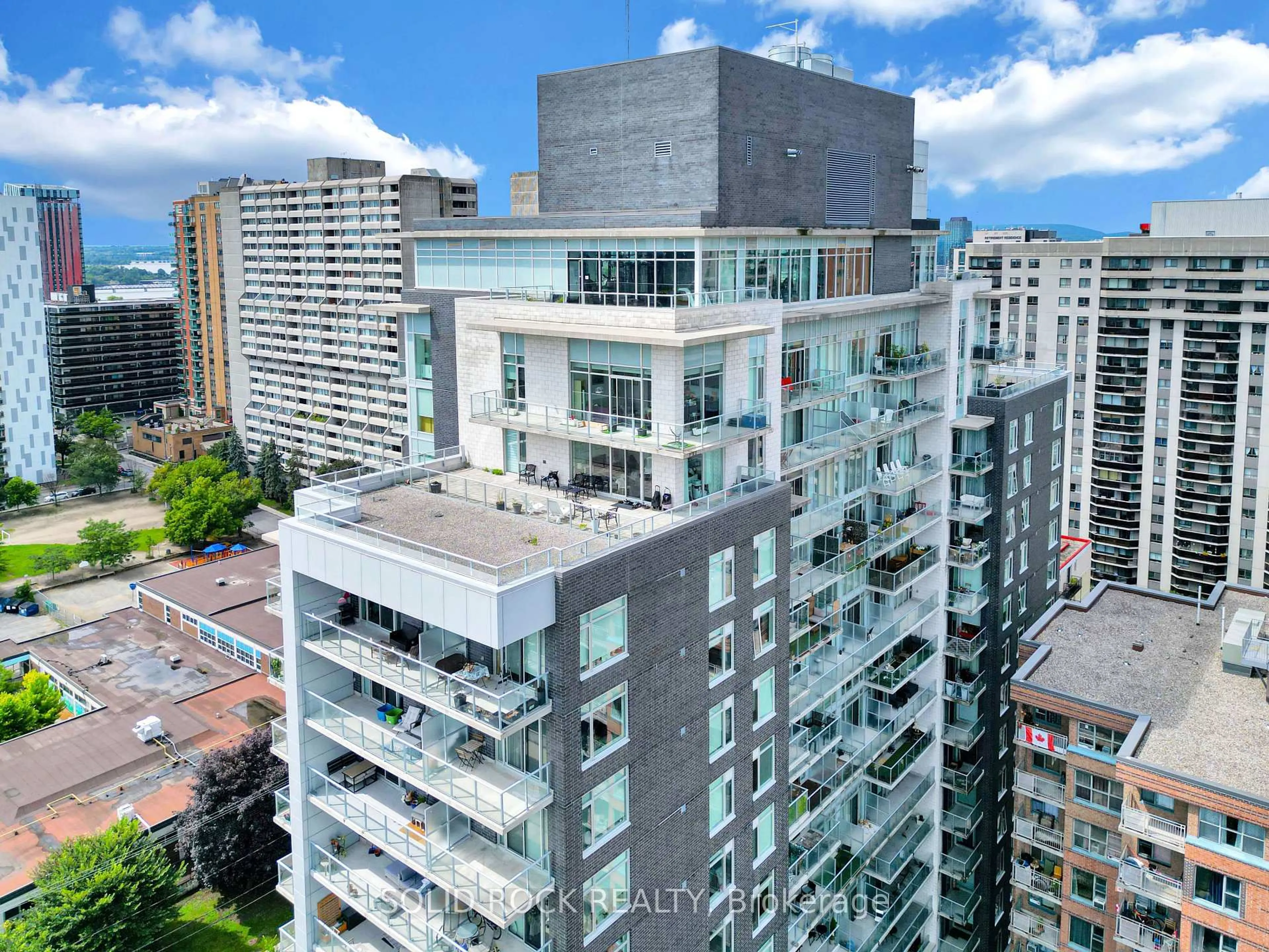A pic from outside/outdoor area/front of a property/back of a property/a pic from drone, city buildings view from balcony for 255 Bay St #309, Ottawa Ontario K1R 0C5