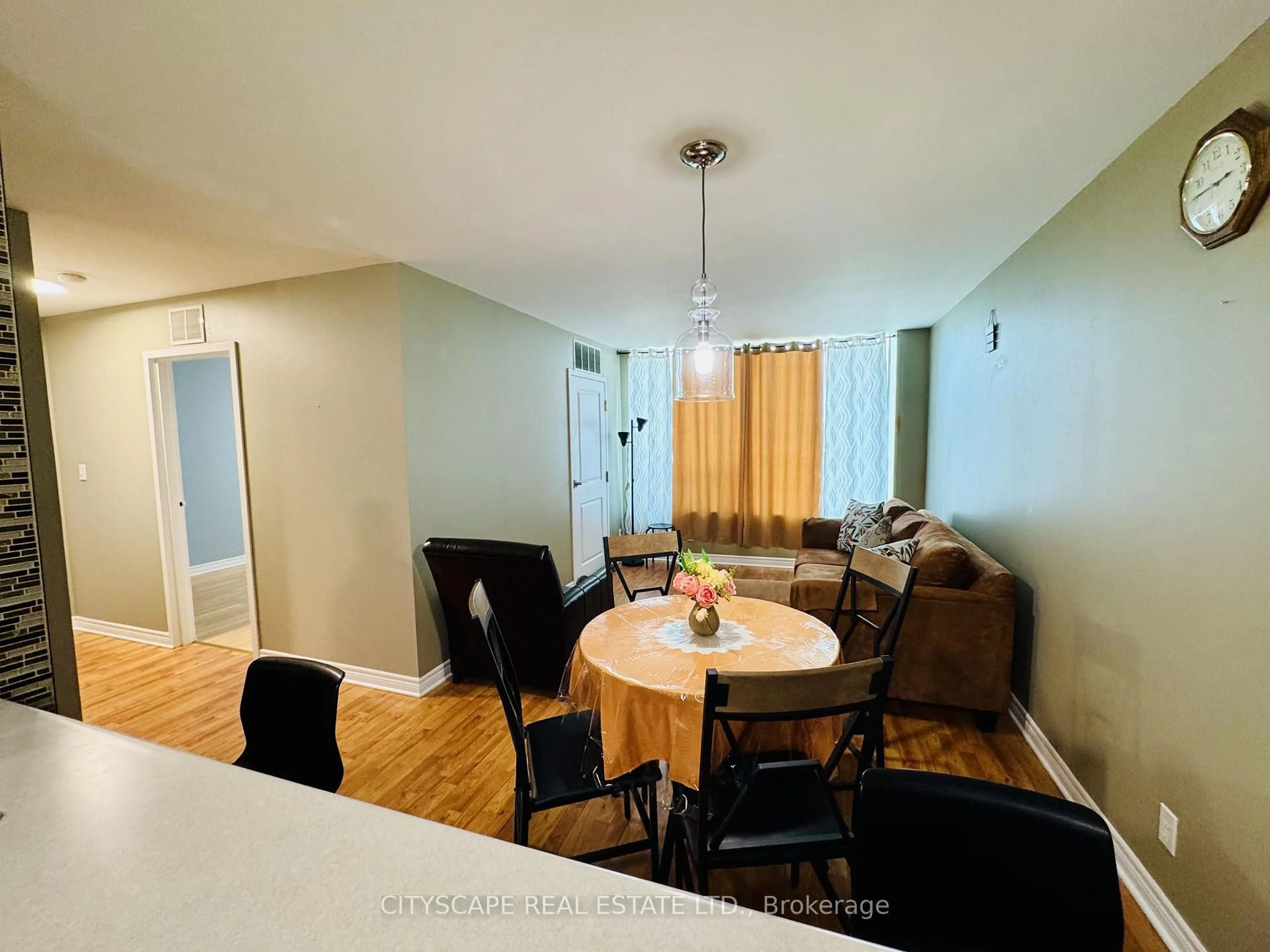 Dining room, wood/laminate floor for 540 Ouellette Ave #5F, Windsor Ontario N9A 1B7