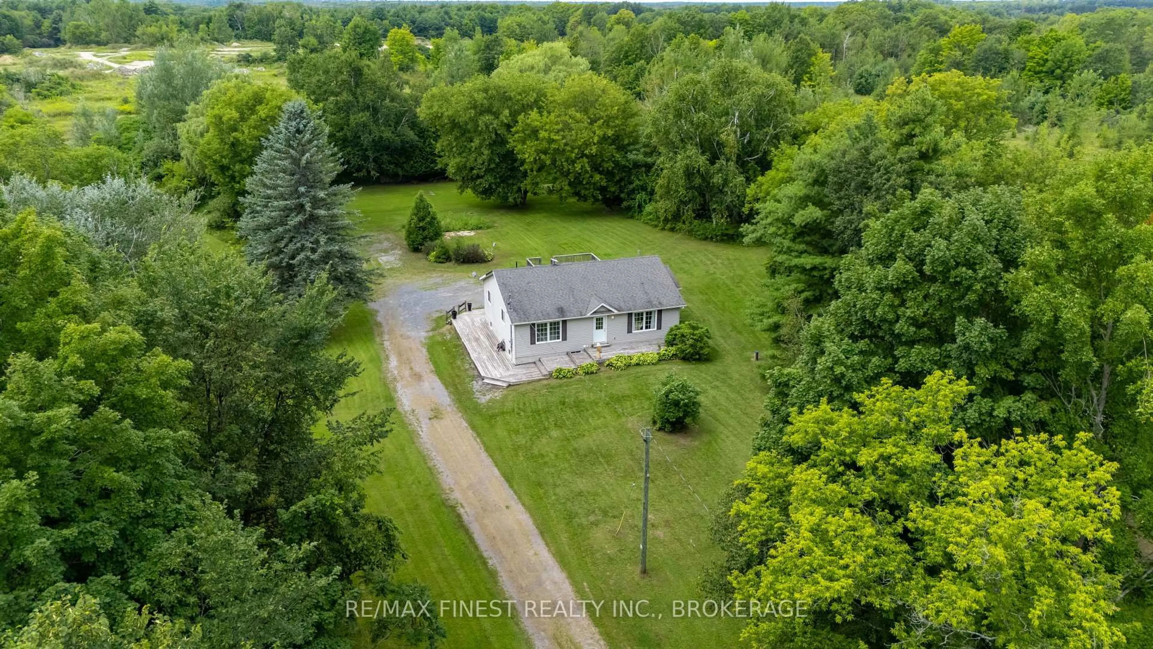 A pic from outside/outdoor area/front of a property/back of a property/a pic from drone, unknown for 695 Westport Rd, Godfrey Ontario K0H 1T0