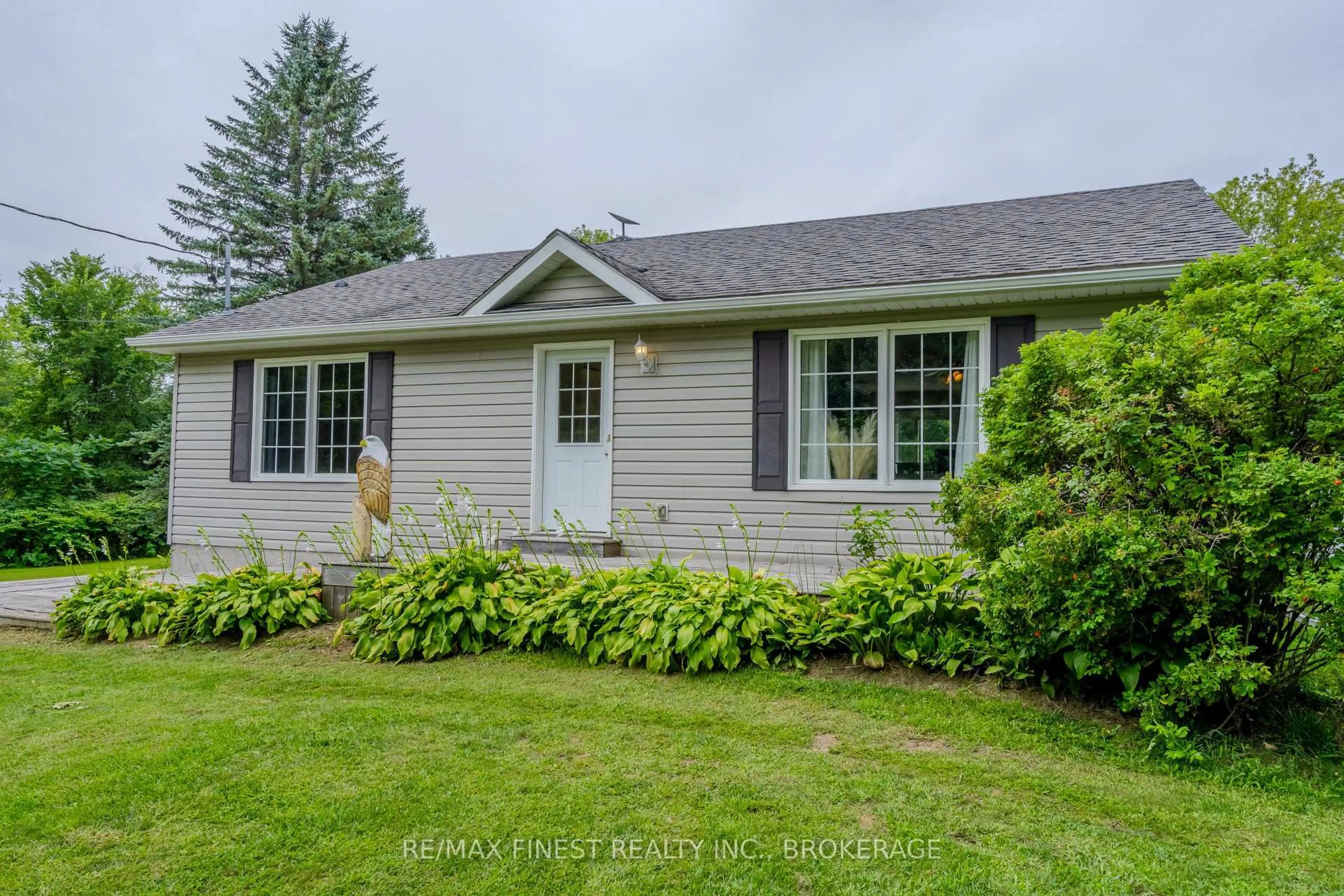 A pic from outside/outdoor area/front of a property/back of a property/a pic from drone, street for 695 Westport Rd, Godfrey Ontario K0H 1T0