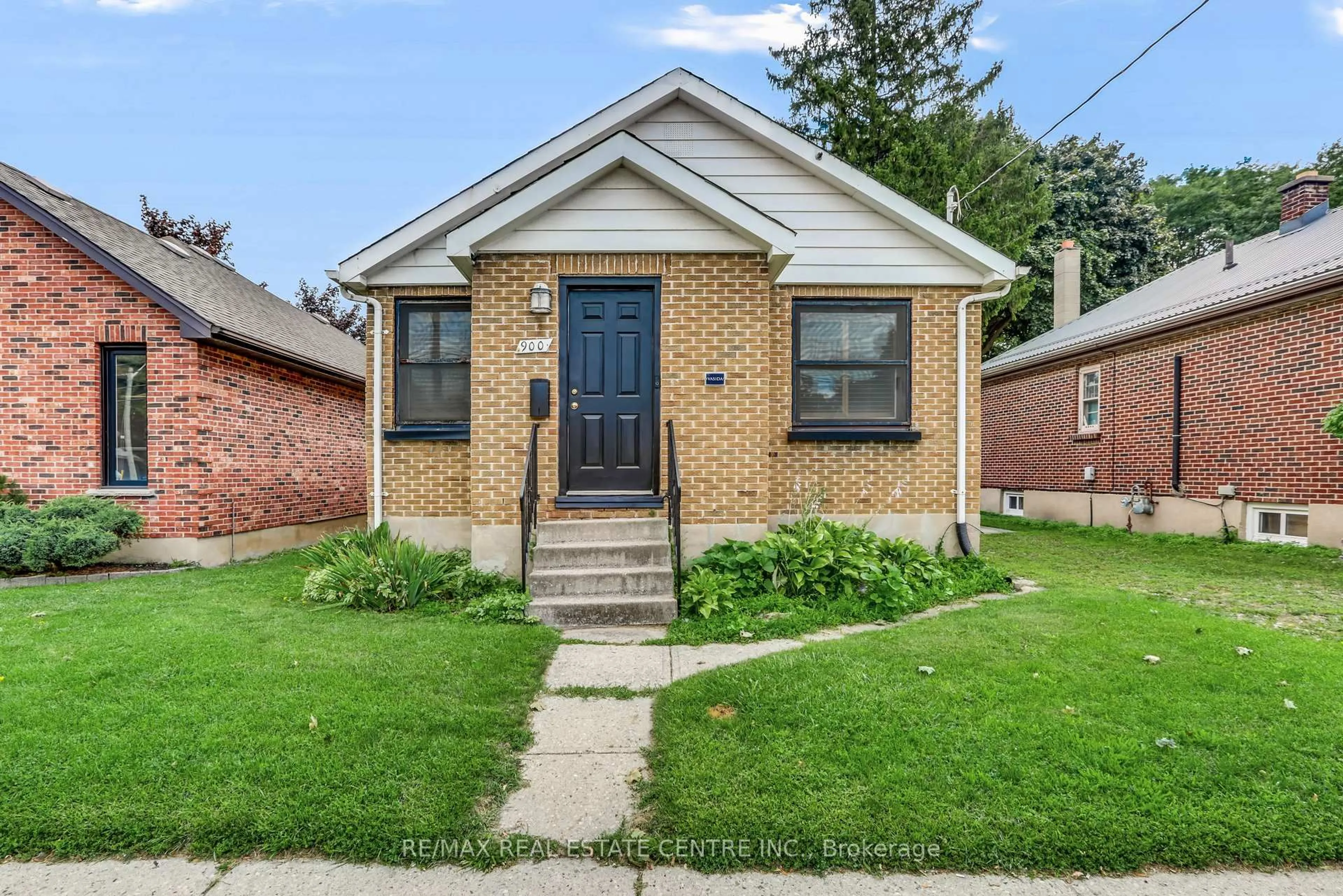 Home with brick exterior material, street for 900 Adelaide St, London East Ontario N5Y 2M5