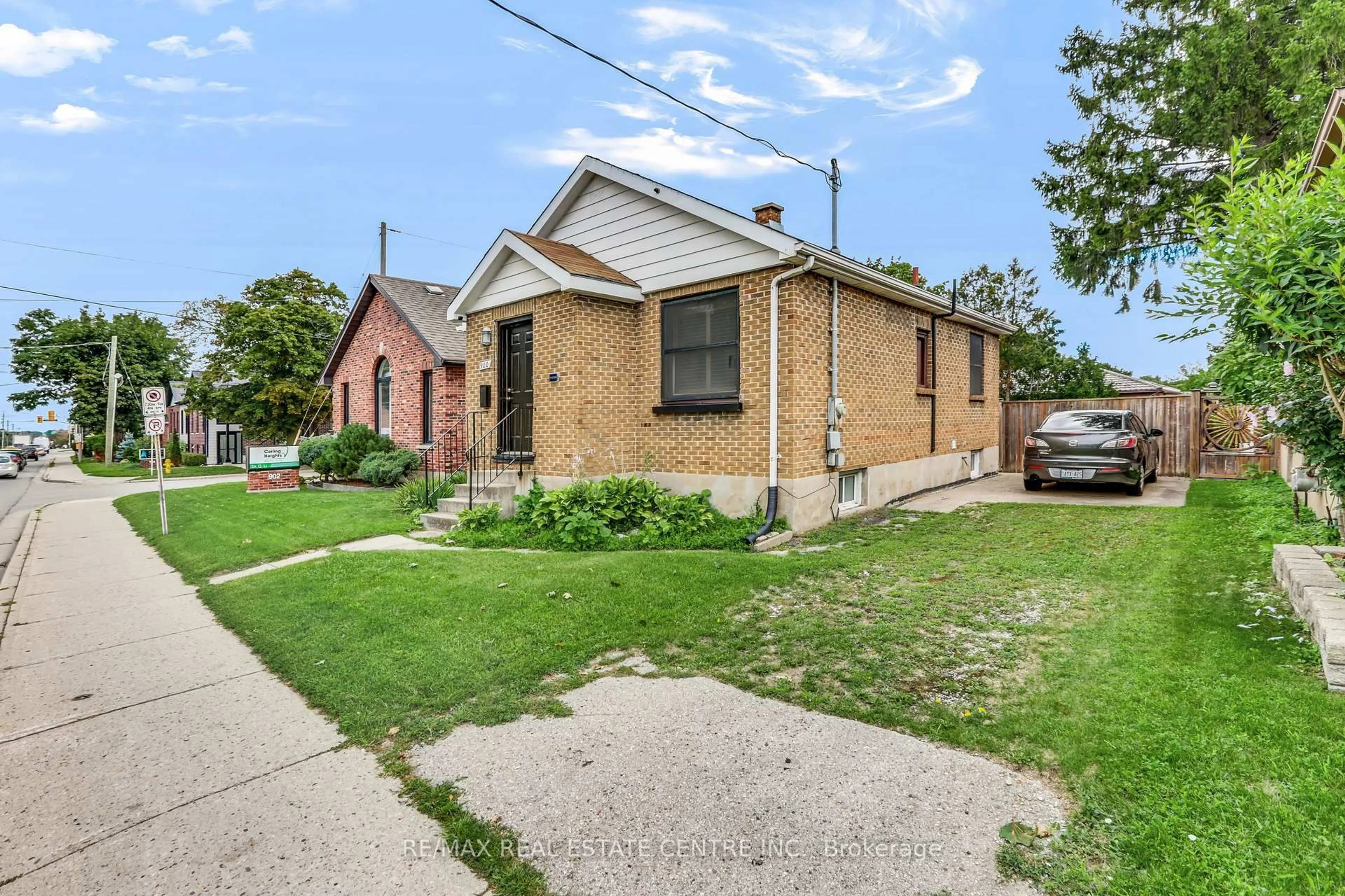 Home with brick exterior material, street for 900 Adelaide St, London East Ontario N5Y 2M5