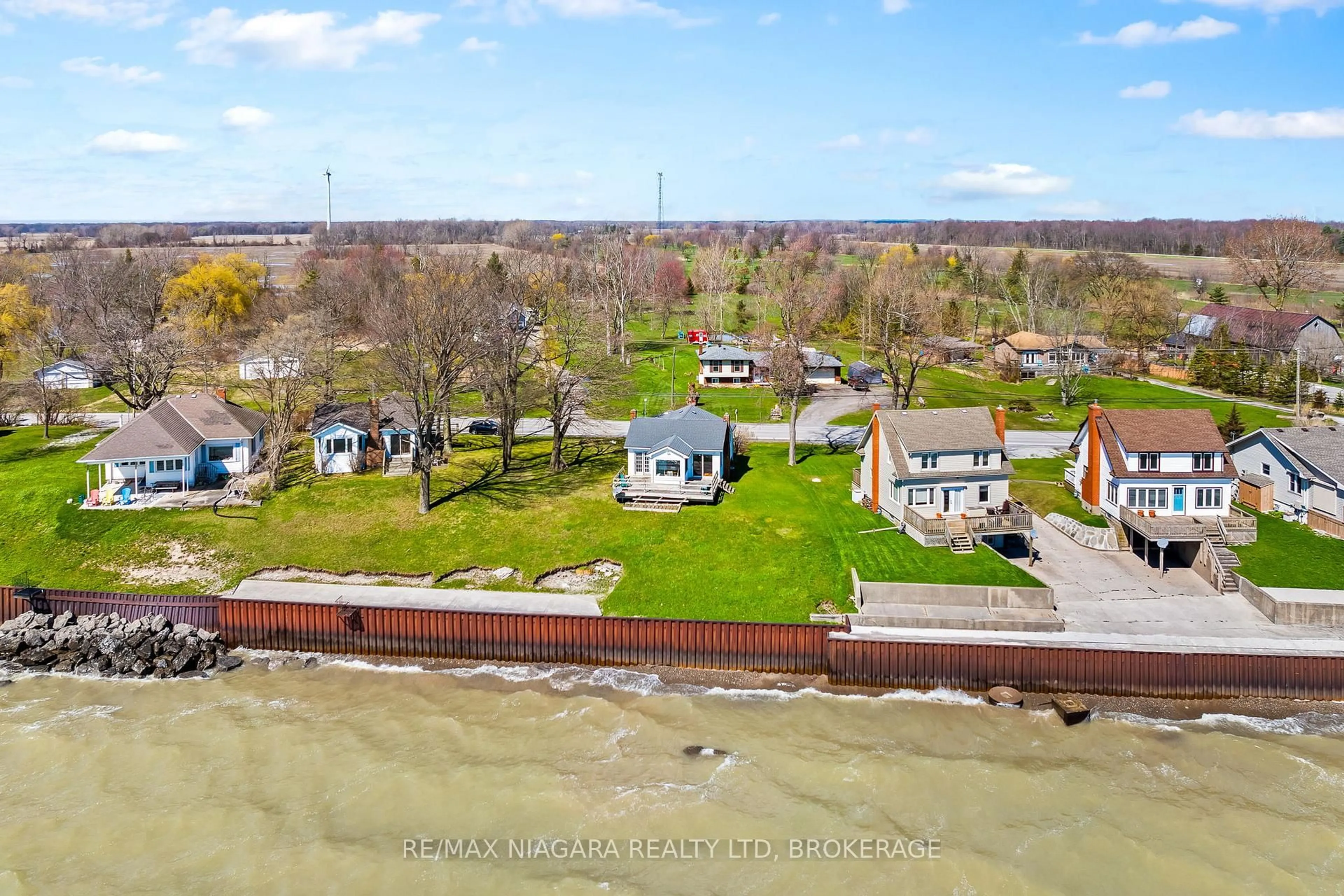 A pic from outside/outdoor area/front of a property/back of a property/a pic from drone, water/lake/river/ocean view for 13165 Lakeshore Rd, Wainfleet Ontario L0S 1V0