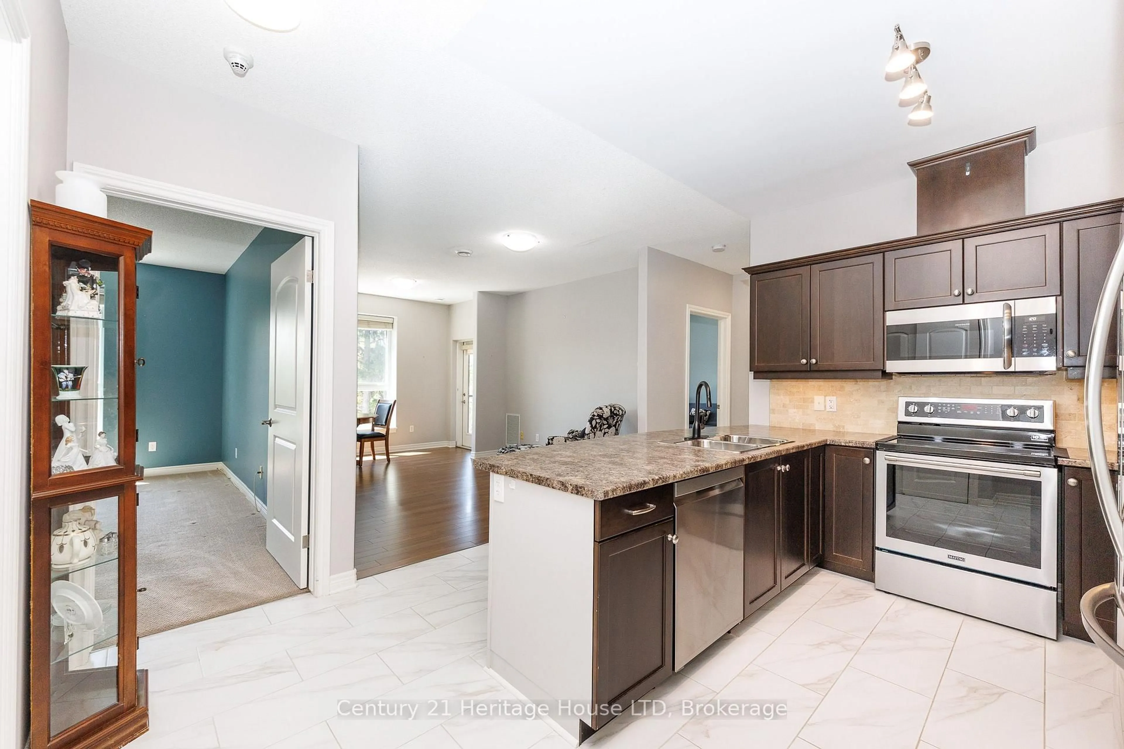 Open concept kitchen, ceramic/tile floor for 2799 St. Paul Ave #311, Niagara Falls Ontario L2J 2L3