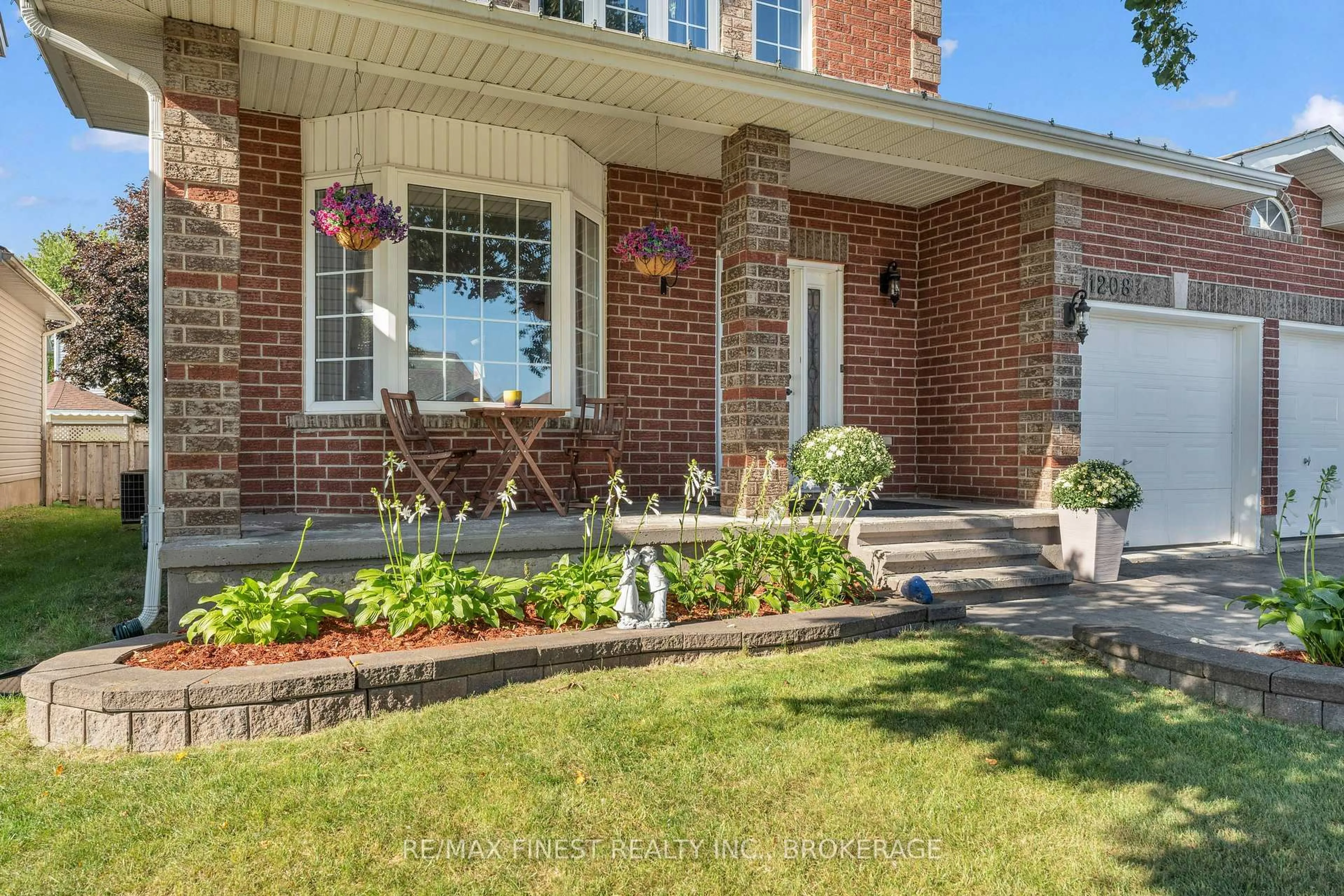 Home with brick exterior material, street for 1208 Greenwood Park Dr, Kingston Ontario K7K 7K3