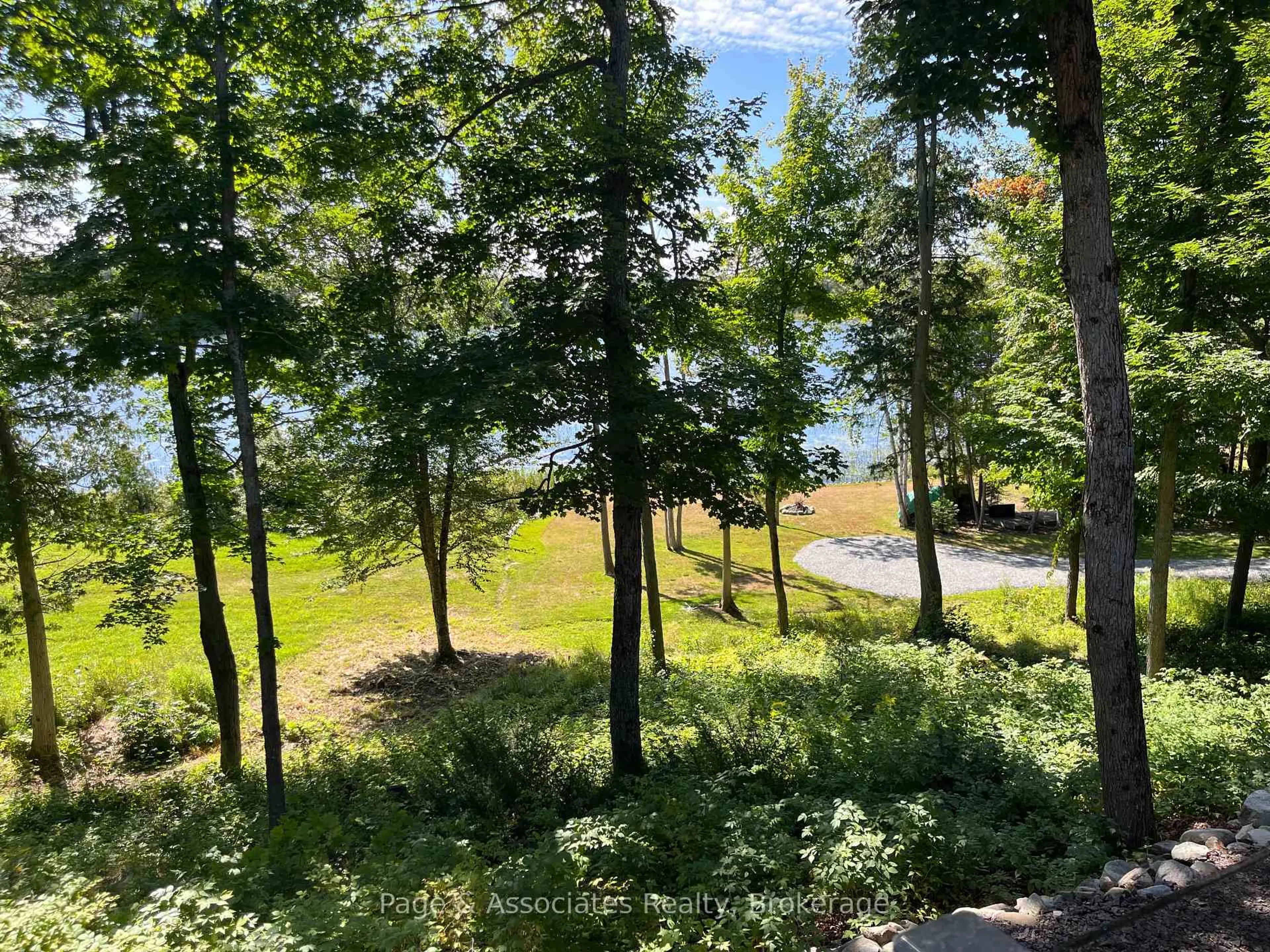A pic from outside/outdoor area/front of a property/back of a property/a pic from drone, forest/trees view for 208 Moose Point Rd, West Nipissing Ontario P0H 1L0