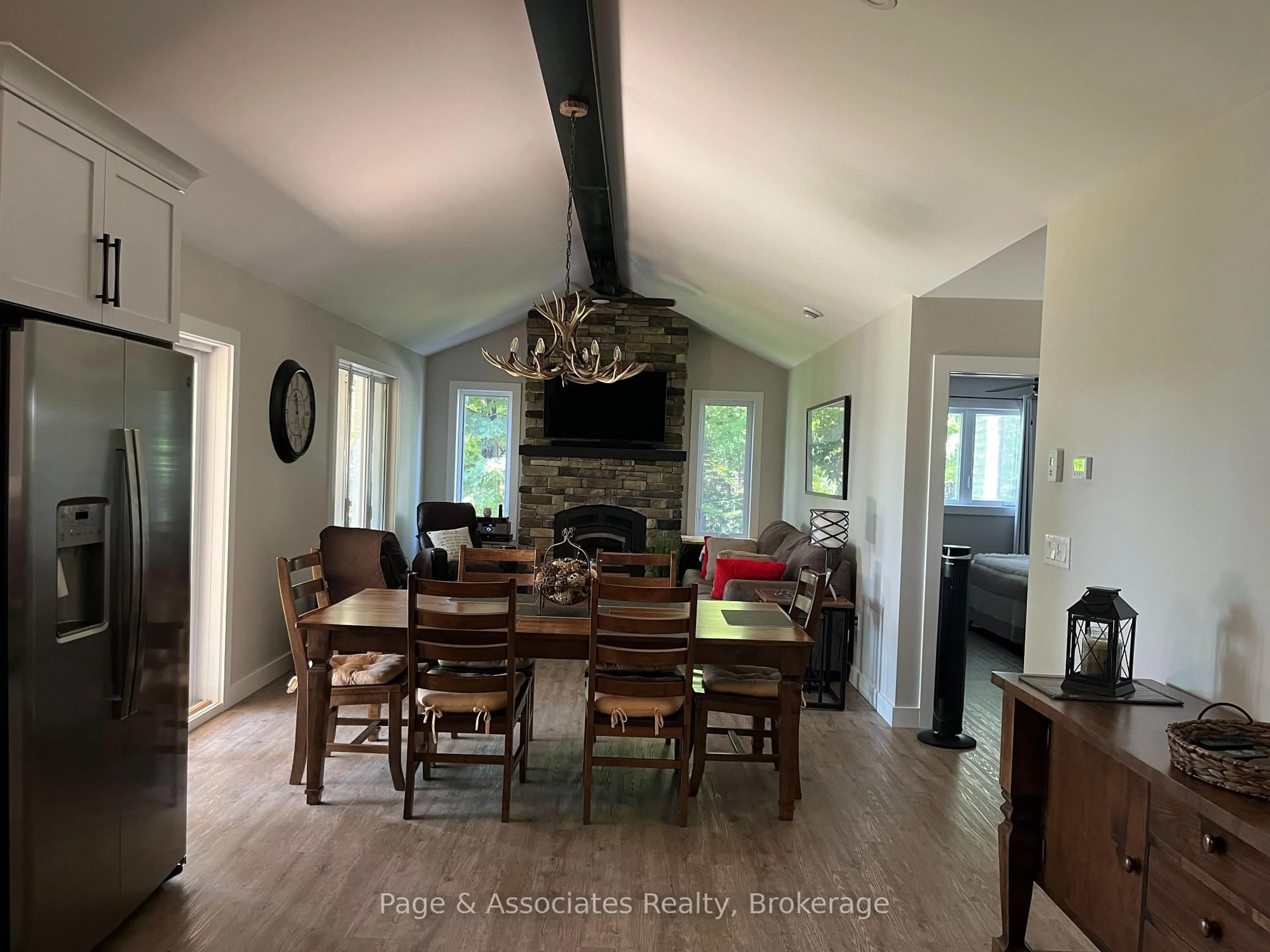 Dining room, wood/laminate floor for 208 Moose Point Rd, West Nipissing Ontario P0H 1L0