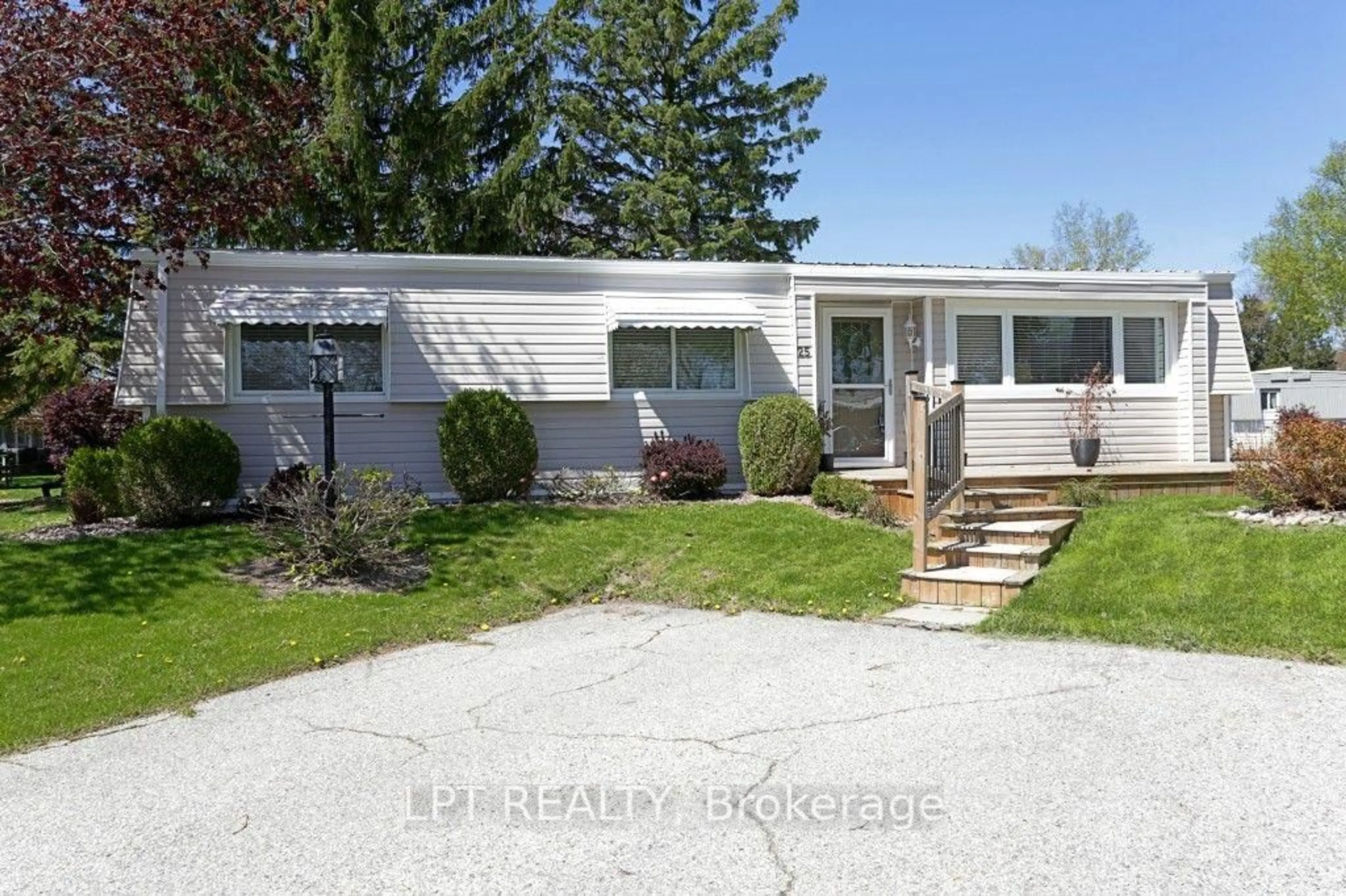 Home with vinyl exterior material, street for 25 Maple Grove Rd, Kawartha Lakes Ontario K9V 4R6