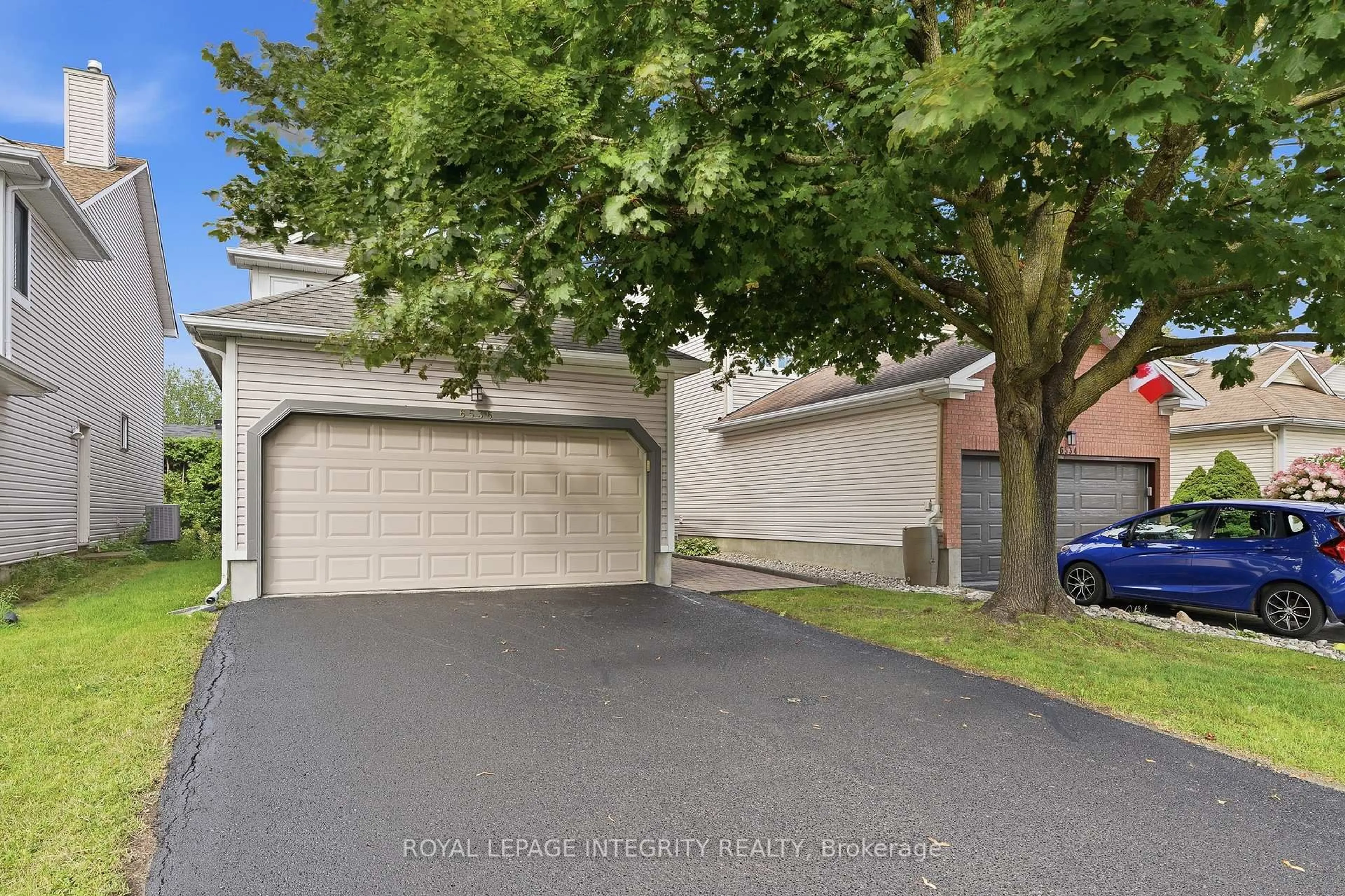 A pic from outside/outdoor area/front of a property/back of a property/a pic from drone, street for 6536 Tooney Dr, Ottawa Ontario K1C 7G9