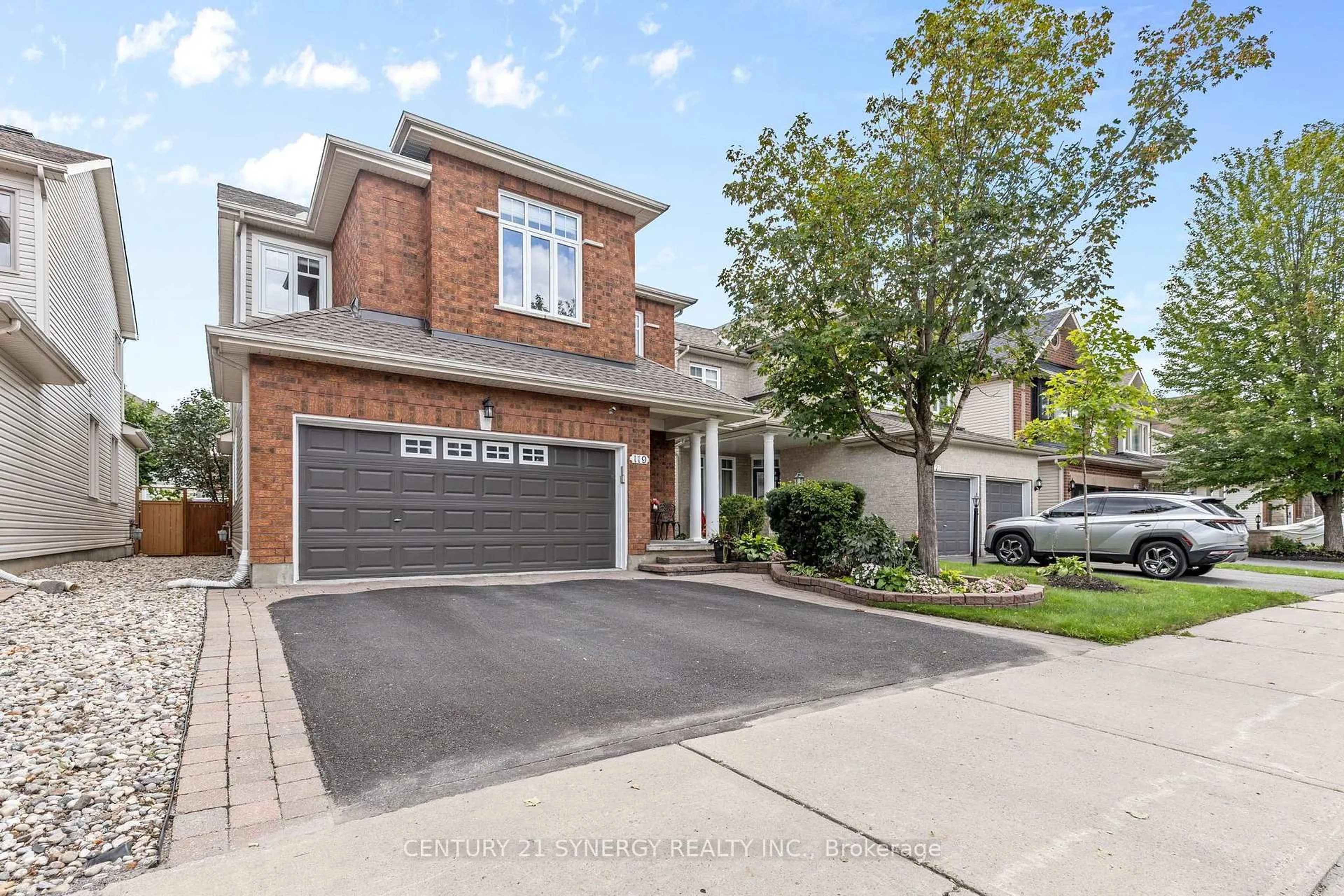 Home with brick exterior material, street for 119 Portrush Ave, Ottawa Ontario K2J 5J2