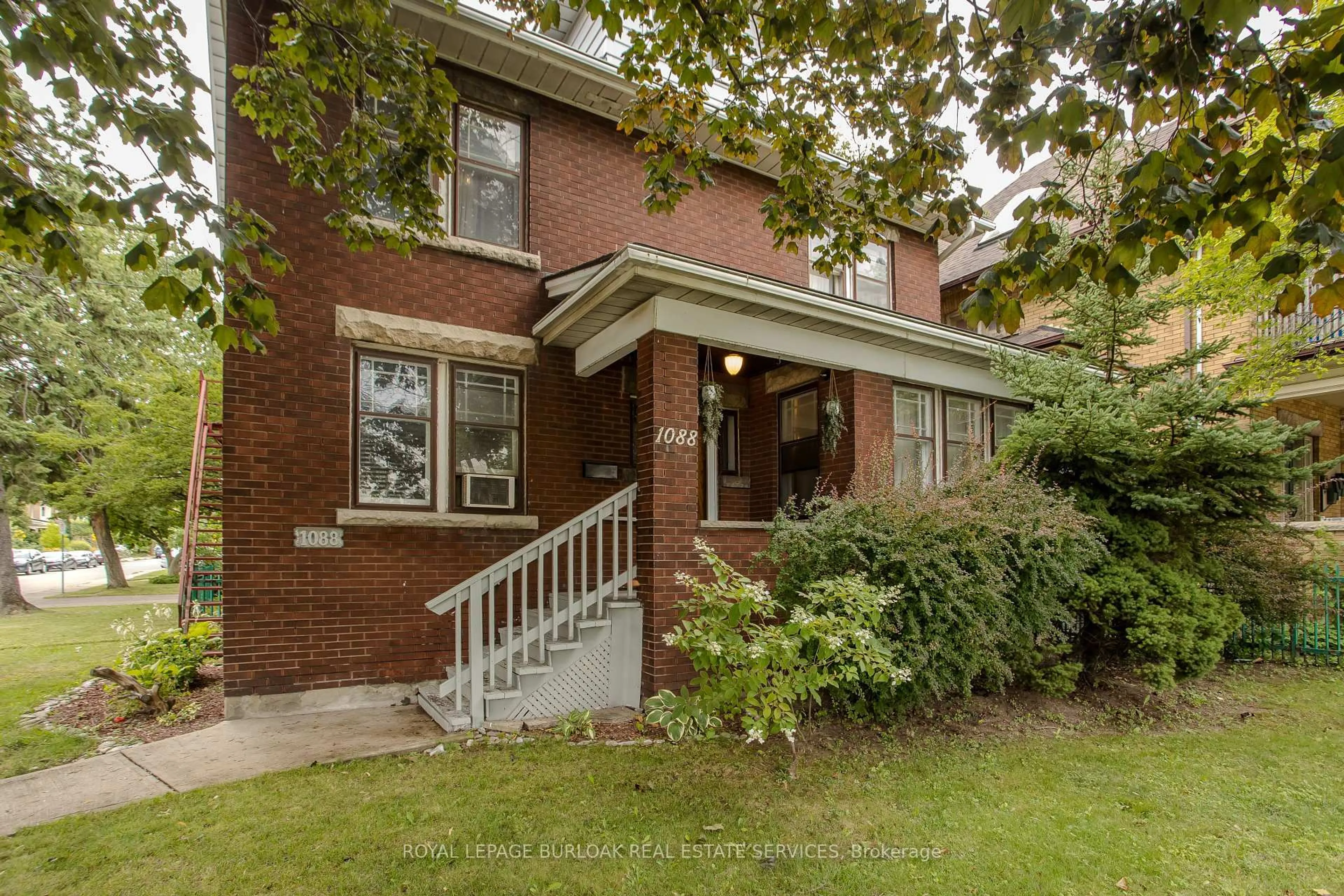 Home with brick exterior material, street for 1088 King St, Hamilton Ontario L8M 1E3