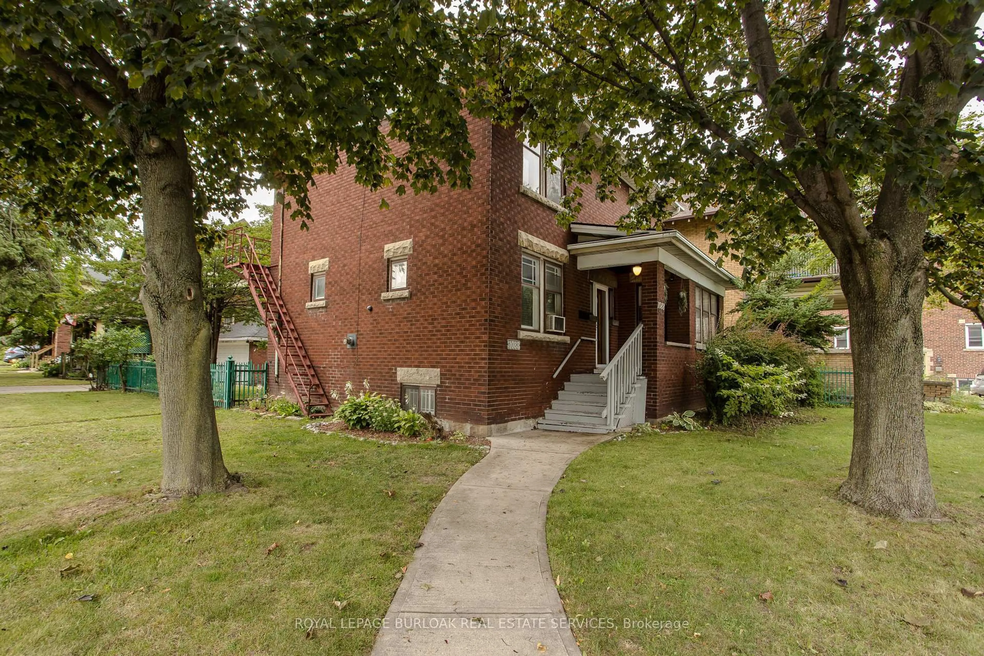 Home with brick exterior material, street for 1088 King St, Hamilton Ontario L8M 1E3