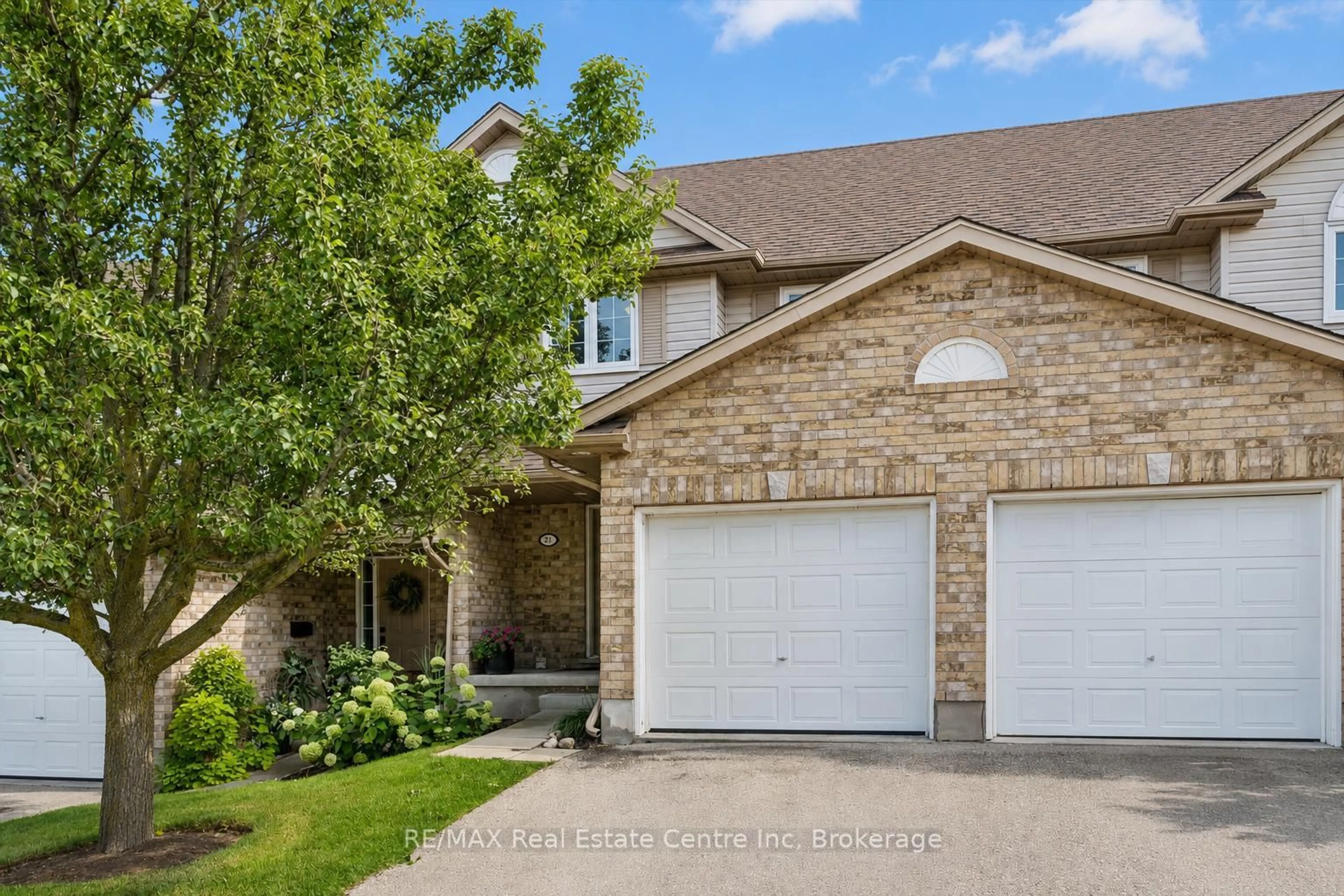 Home with brick exterior material, street for 31 SCHRODER Cres #21, Guelph Ontario N1E 7M6
