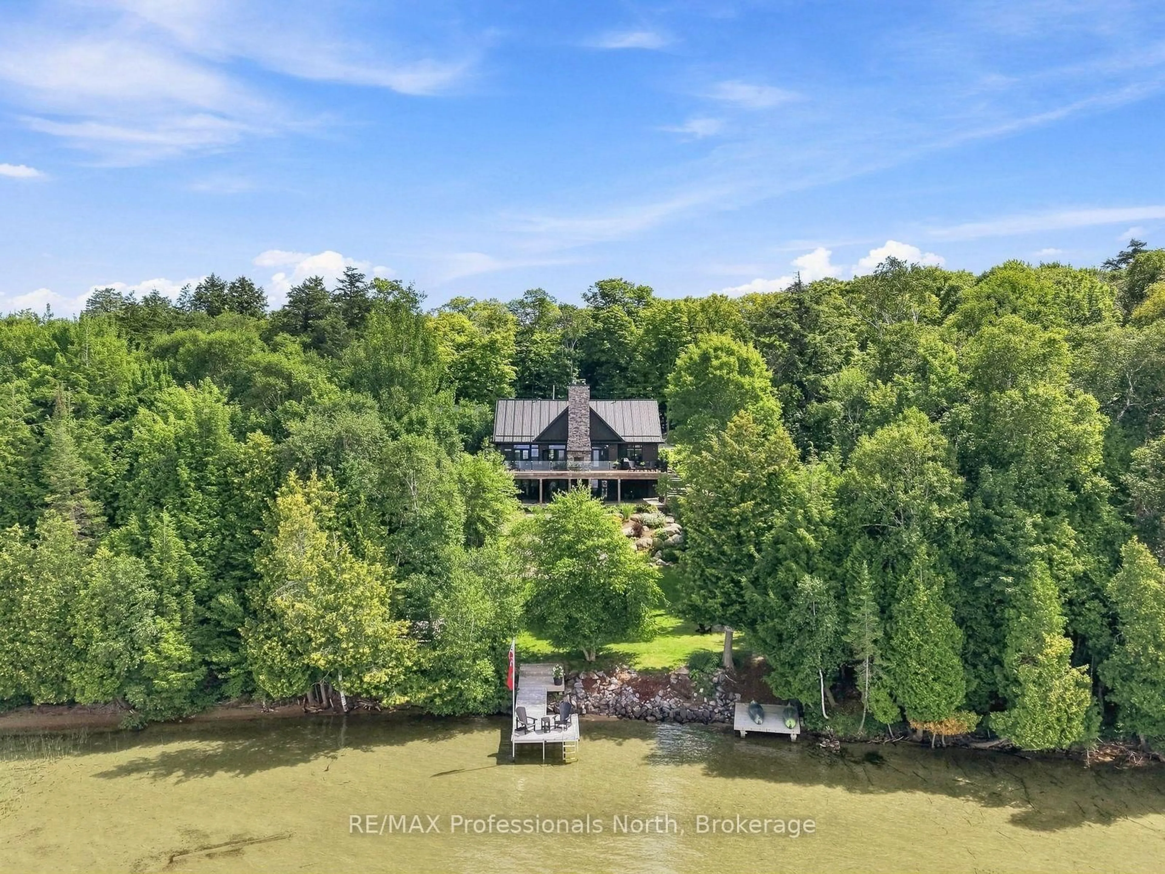 A pic from outside/outdoor area/front of a property/back of a property/a pic from drone, water/lake/river/ocean view for 1126A S Lake Bernard Rd, Strong Ontario P0A 1Z0