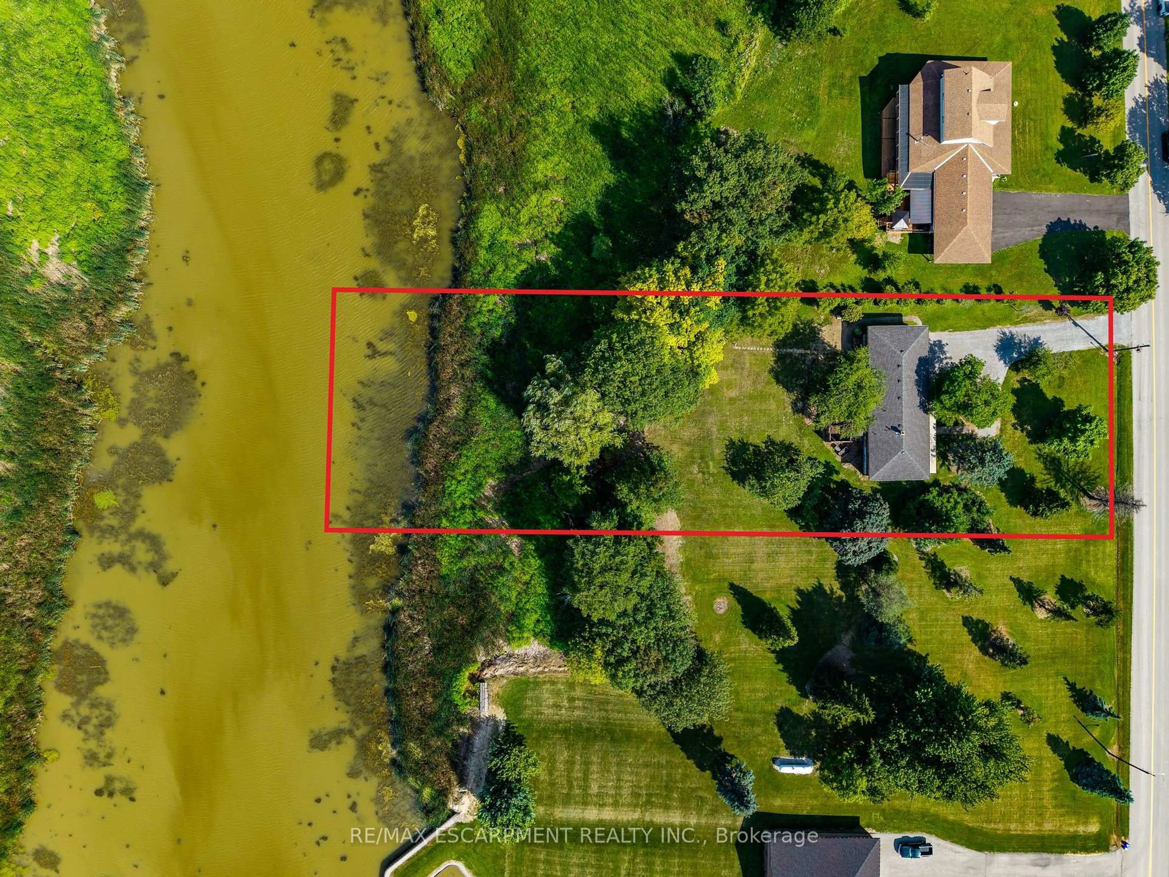 A pic from outside/outdoor area/front of a property/back of a property/a pic from drone, water/lake/river/ocean view for 107 Erie St, Haldimand Ontario N0A 1L0