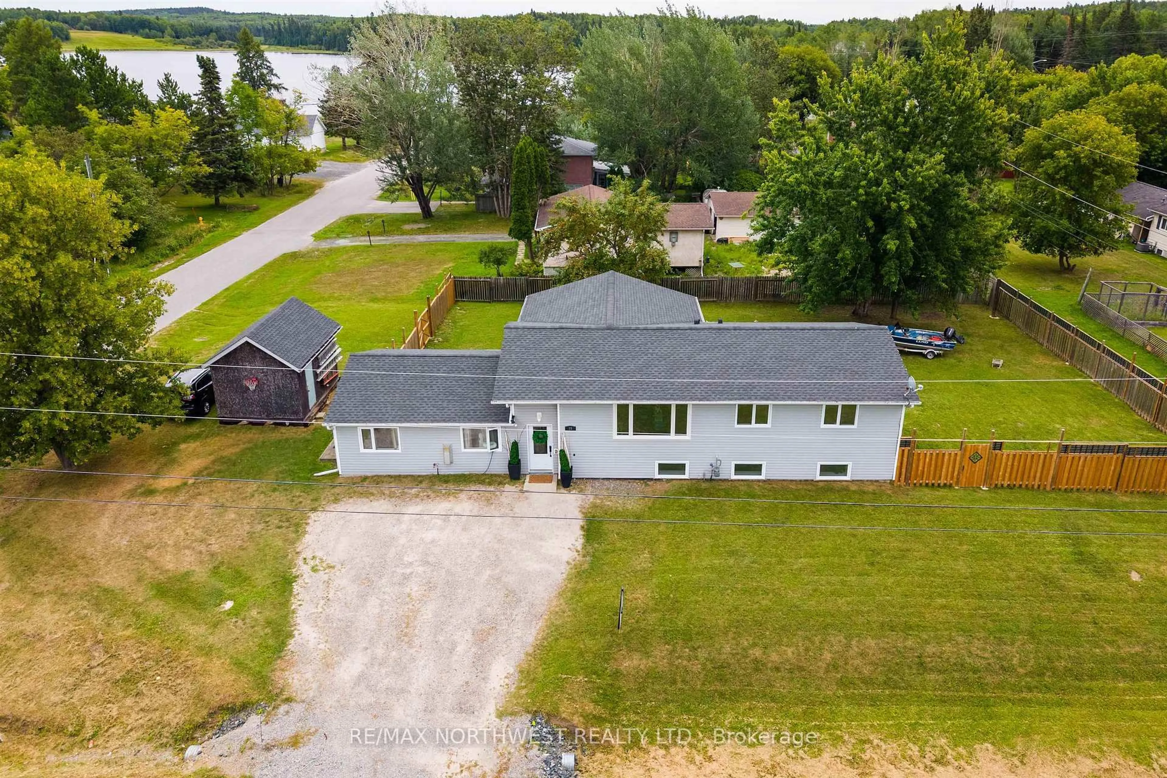 A pic from outside/outdoor area/front of a property/back of a property/a pic from drone, water/lake/river/ocean view for 25 Park Avenue, Kenora Ontario P9N 3W8