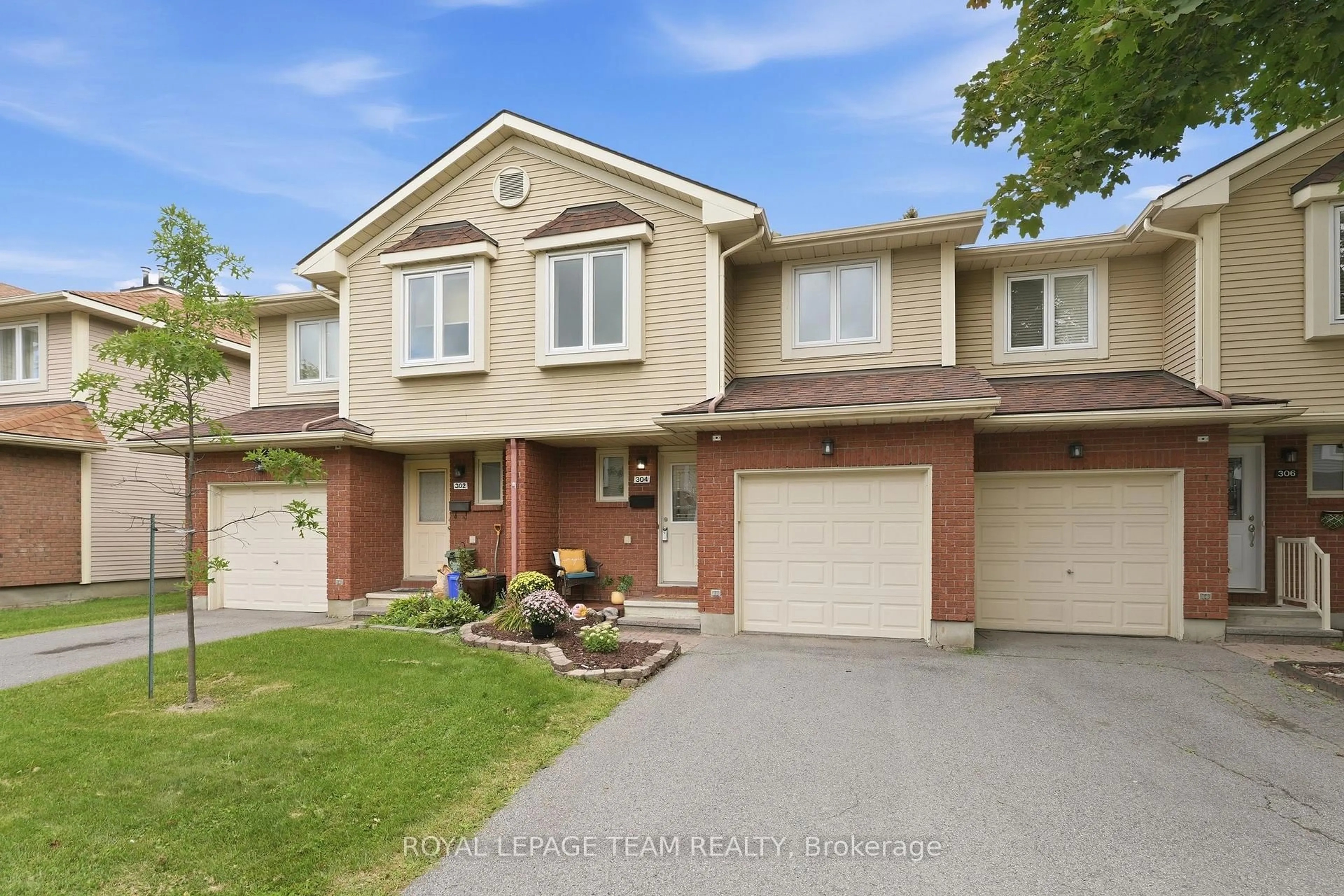 Home with brick exterior material, street for 304 Valade Cres, Orleans Ontario K4A 2X3