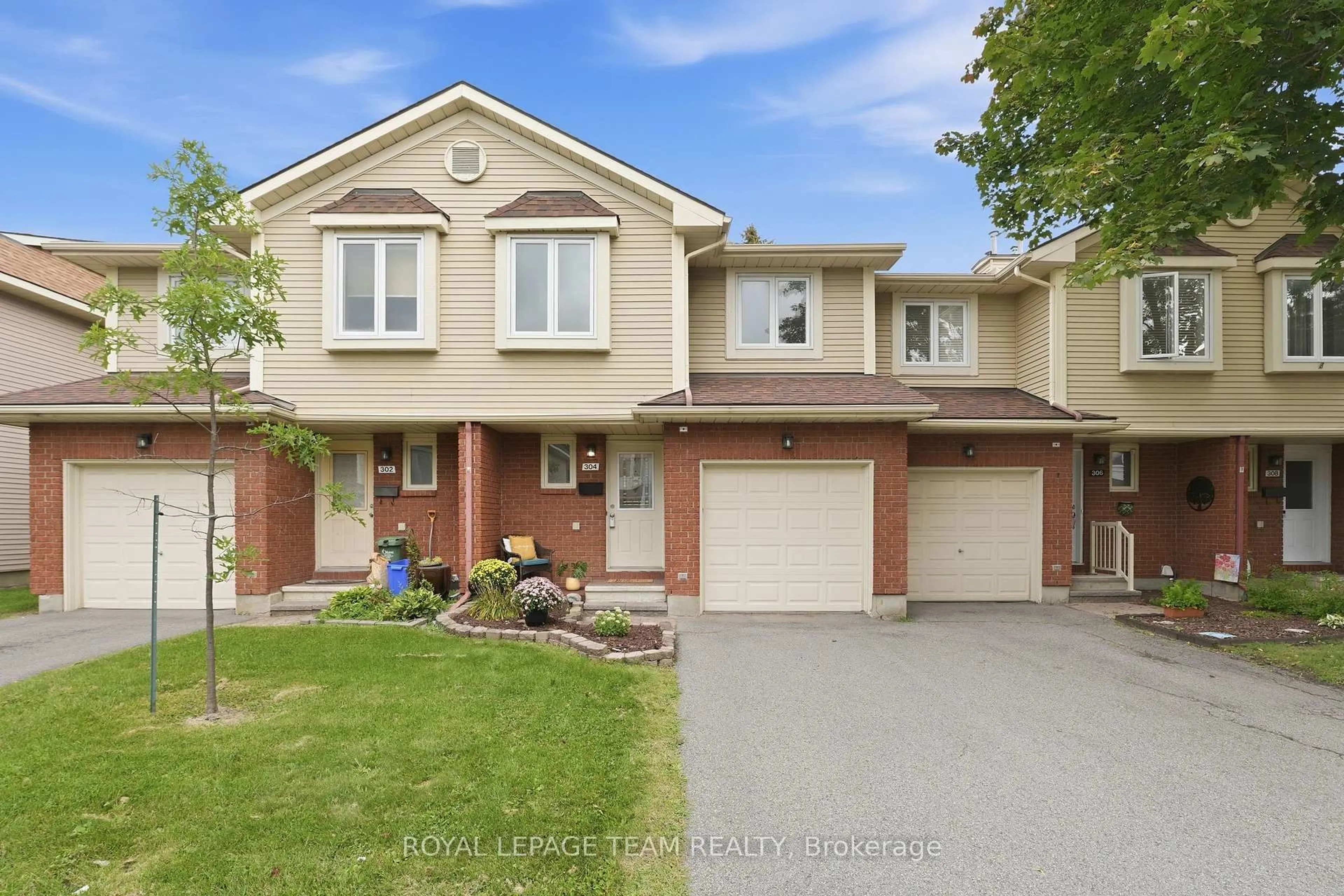 Home with brick exterior material, street for 304 Valade Cres, Orleans Ontario K4A 2X3