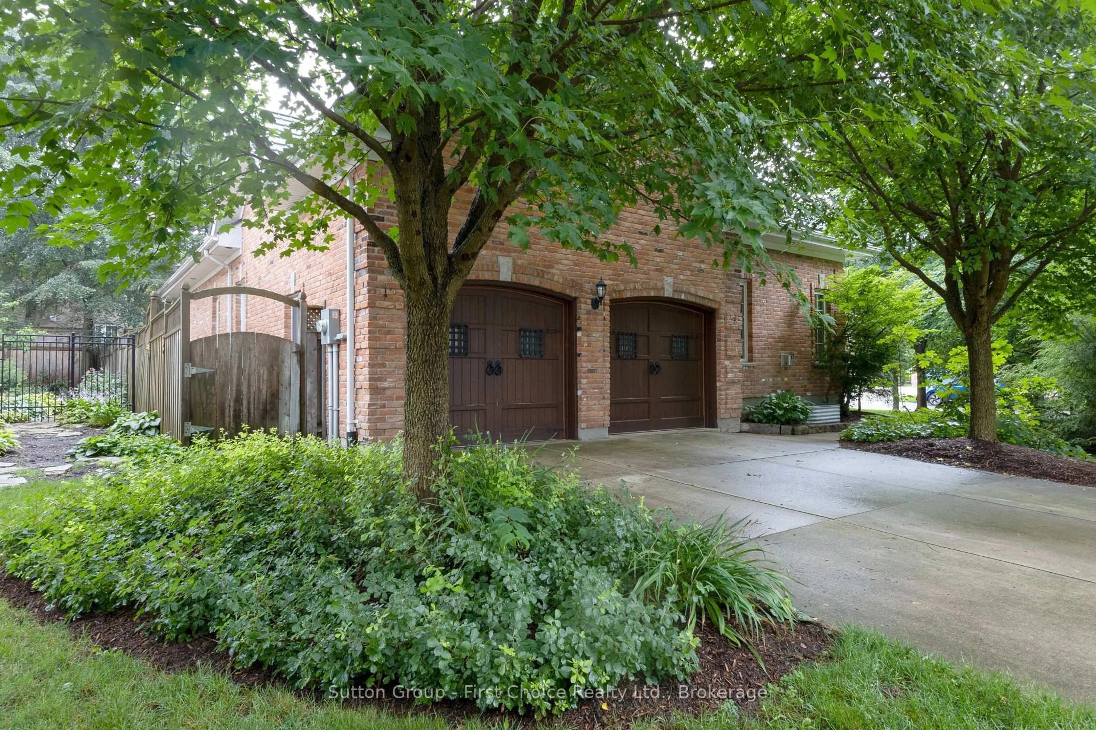 Home with brick exterior material, street for 70 Crawford St, Stratford Ontario N5A 5Y4