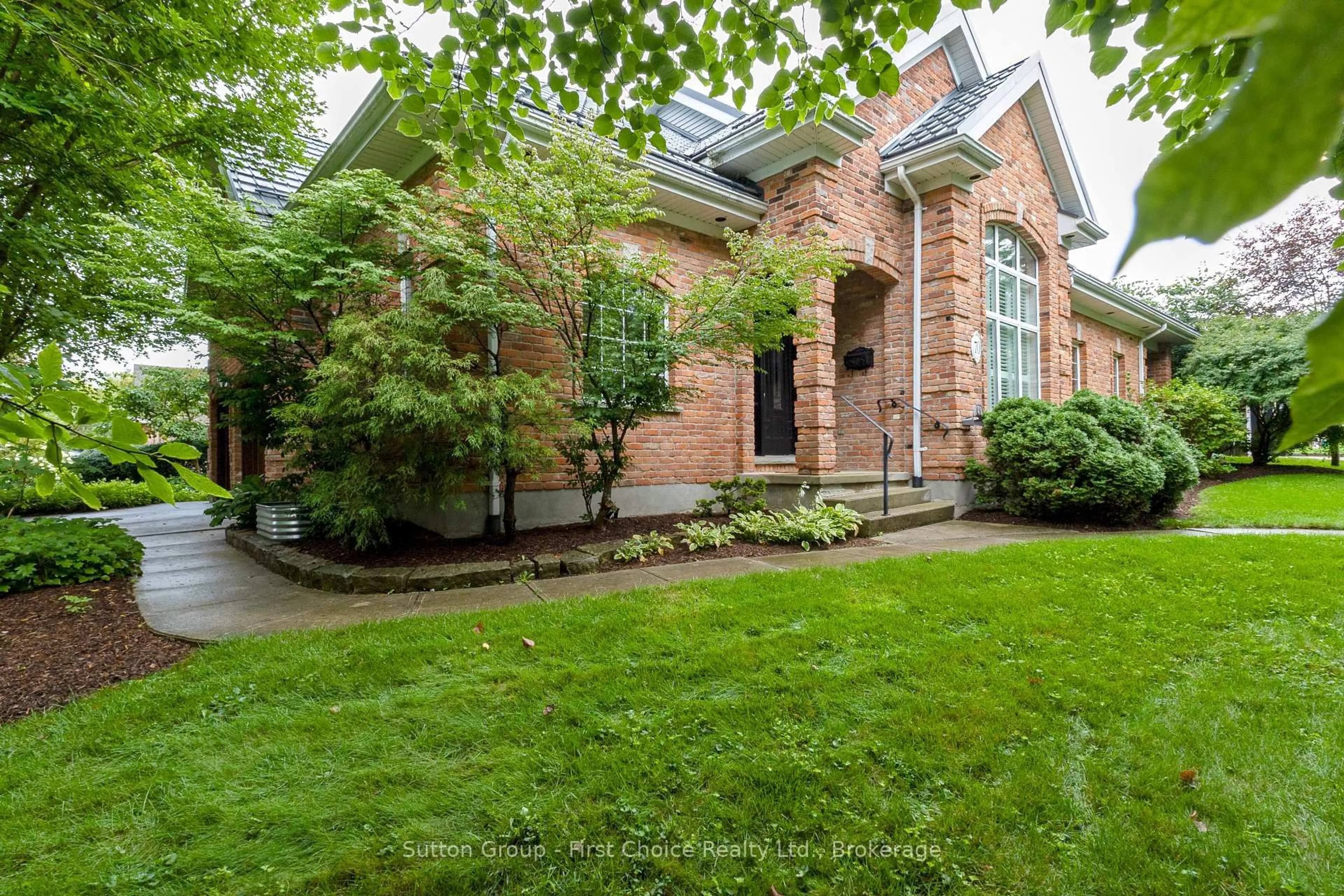 Home with brick exterior material, street for 70 Crawford St, Stratford Ontario N5A 5Y4