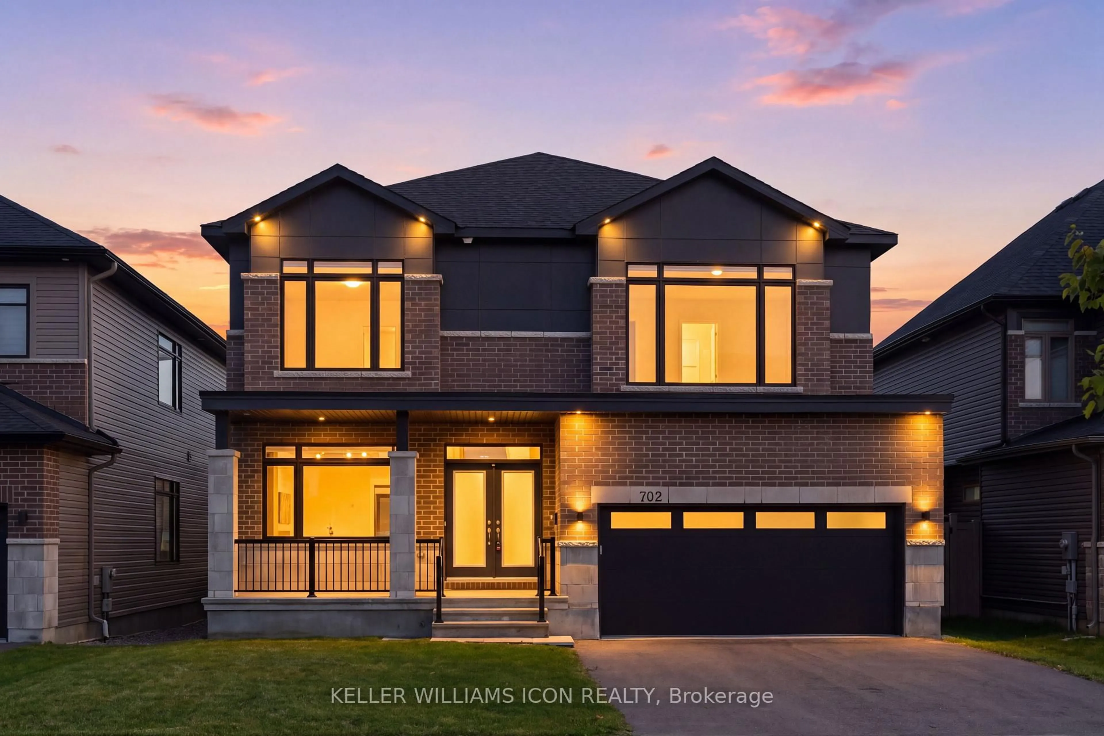 Home with brick exterior material, street for 702 ROSALES Rdge, Ottawa Ontario K1T 0V5