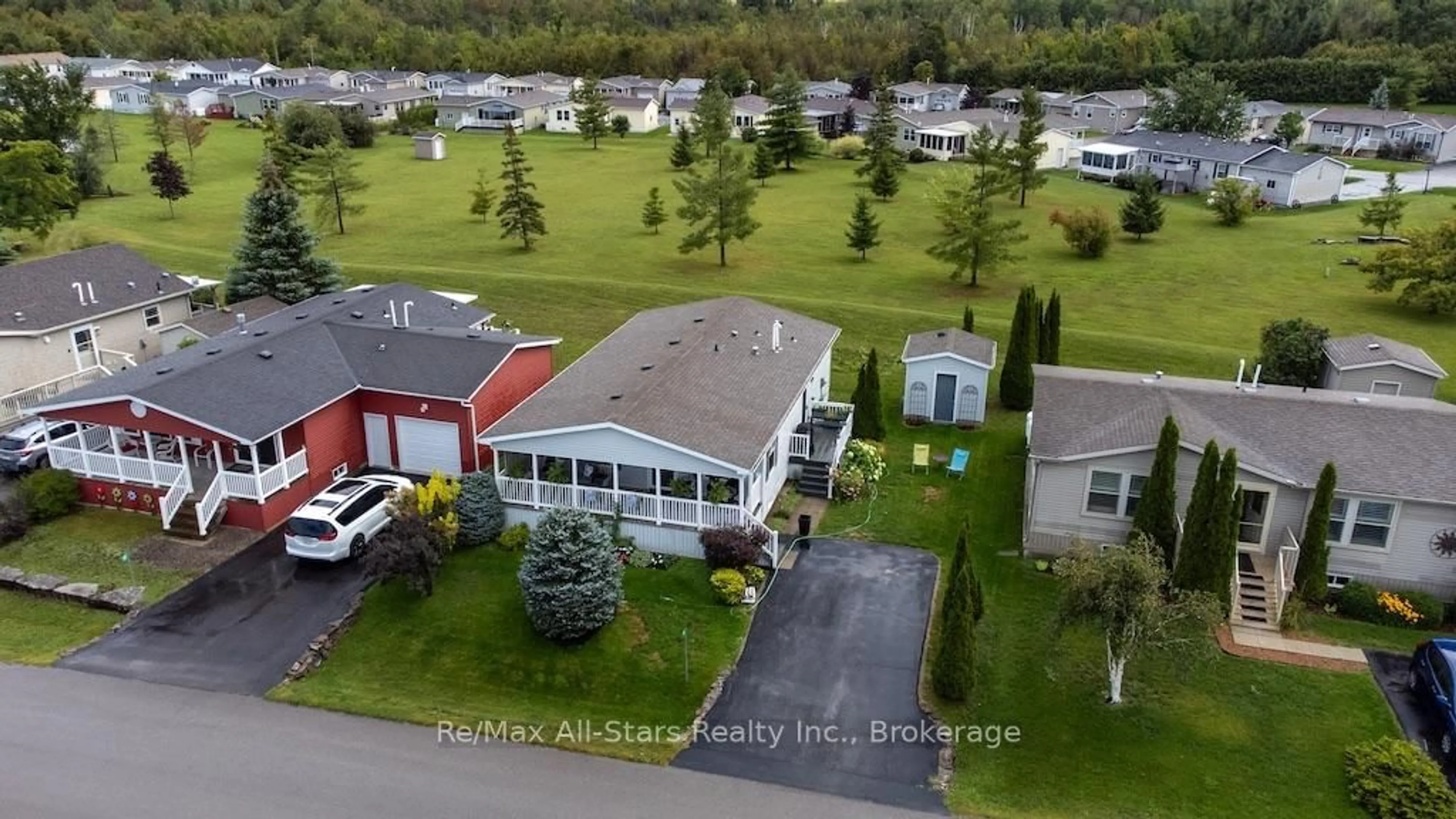 A pic from outside/outdoor area/front of a property/back of a property/a pic from drone, unknown for 51 Creekside Circ, Kawartha Lakes Ontario K0M 1L0