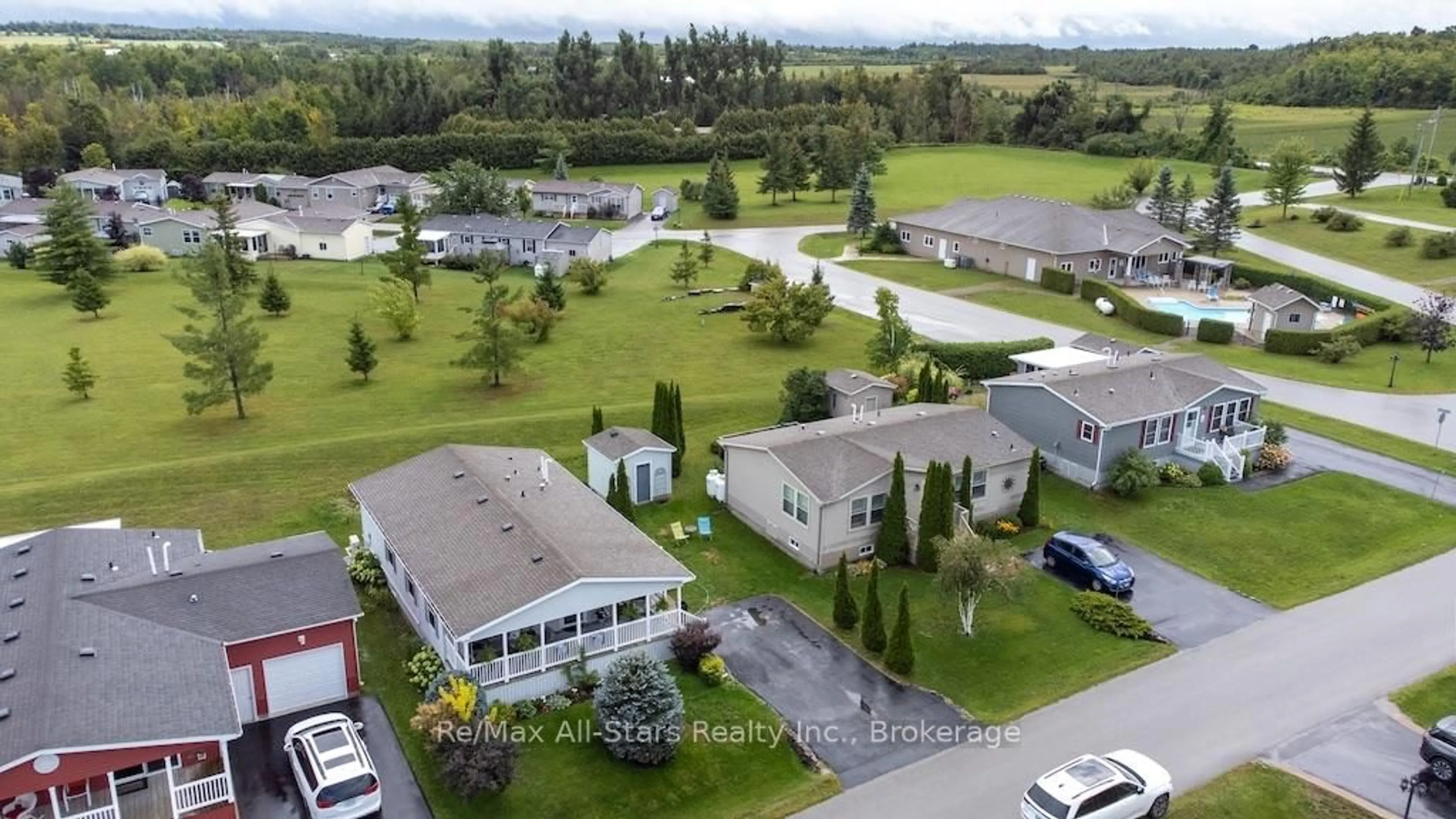 A pic from outside/outdoor area/front of a property/back of a property/a pic from drone, mountain view for 51 Creekside Circ, Kawartha Lakes Ontario K0M 1L0